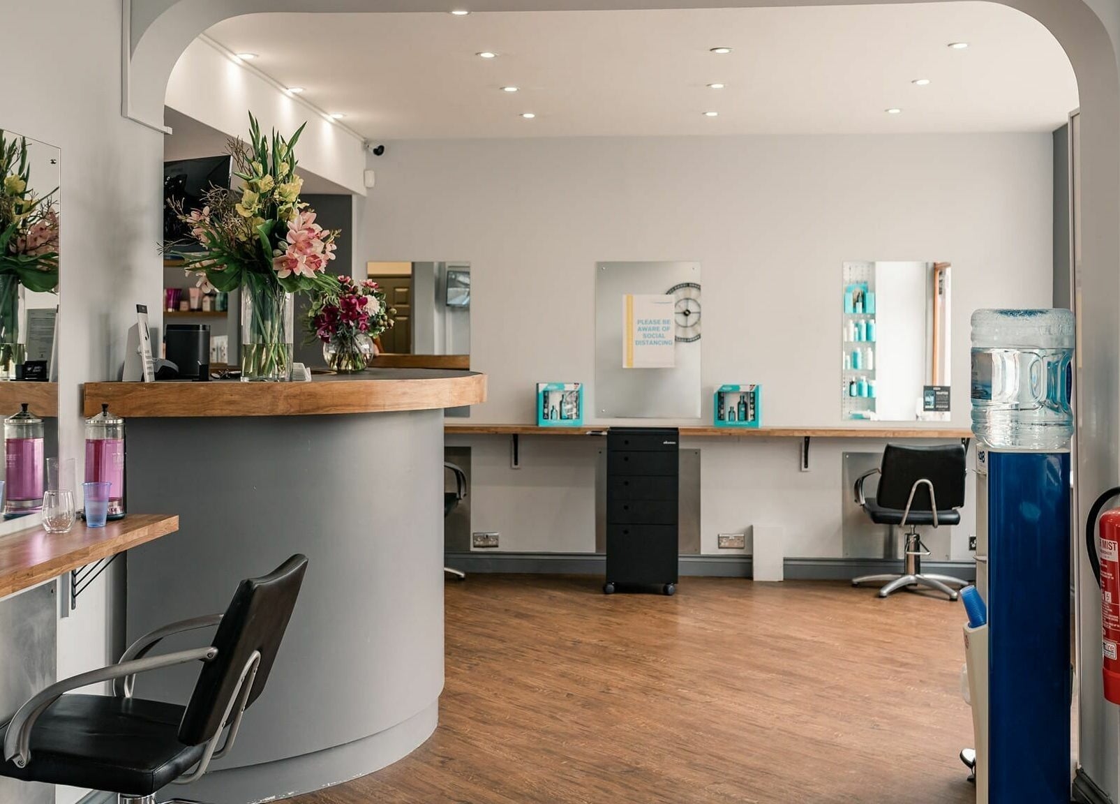 Pelo Bonito reception area with stylish decor and seating in Fladbury, England, GB.