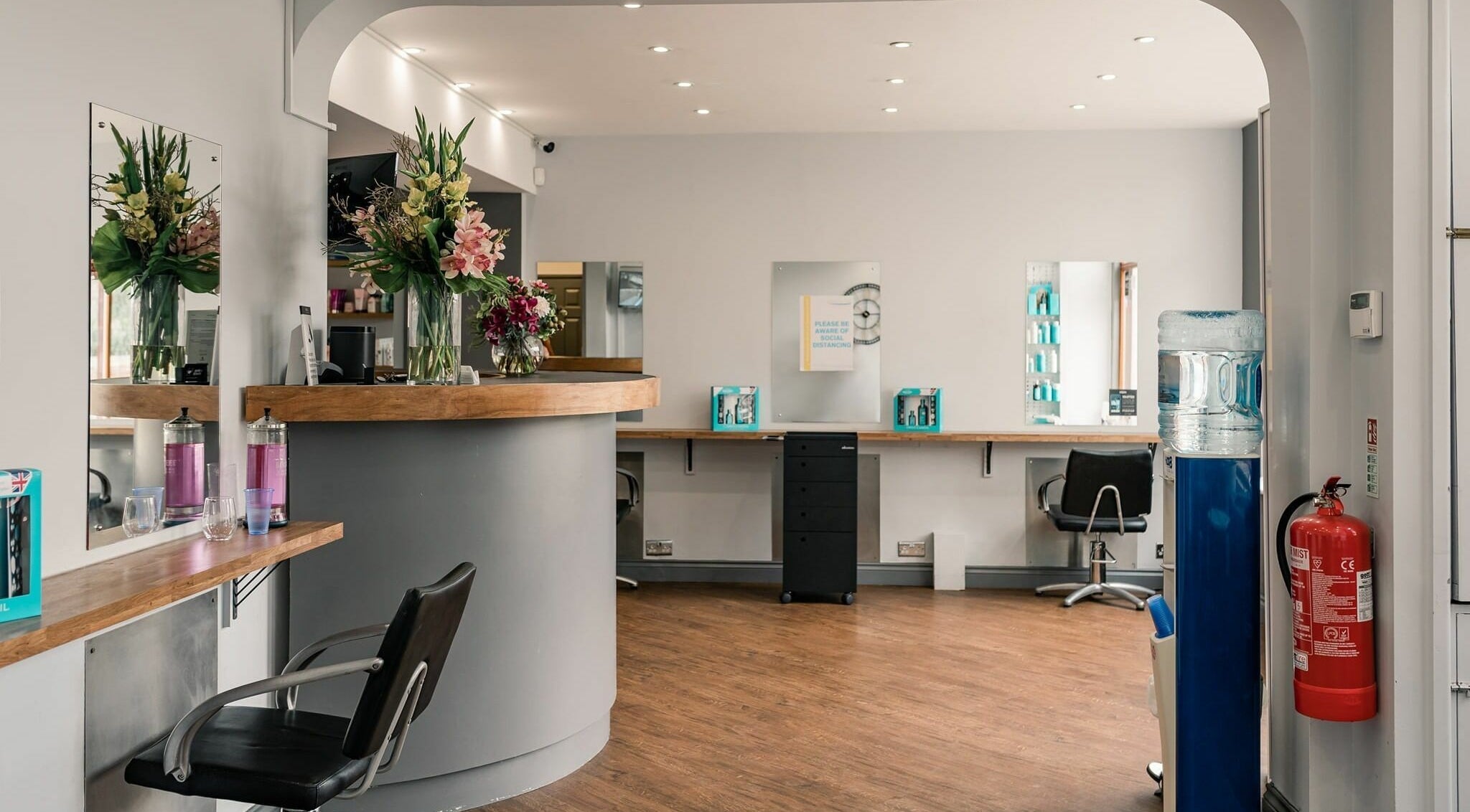 Pelo Bonito reception area with stylish decor and seating in Fladbury, England, GB.