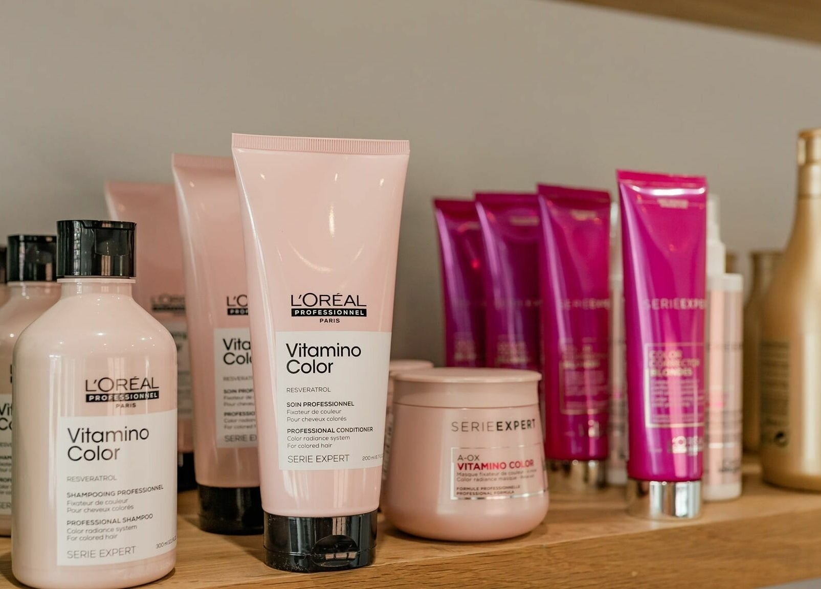 L'Oréal hair care products on shelf at Pelo Bonito, Fladbury, England, GB offer vibrant color solutions.