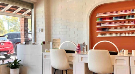 Nail bar at Sala Nails & Spa in Gosnells, Western Australia, AU with vibrant polish display and modern decor.