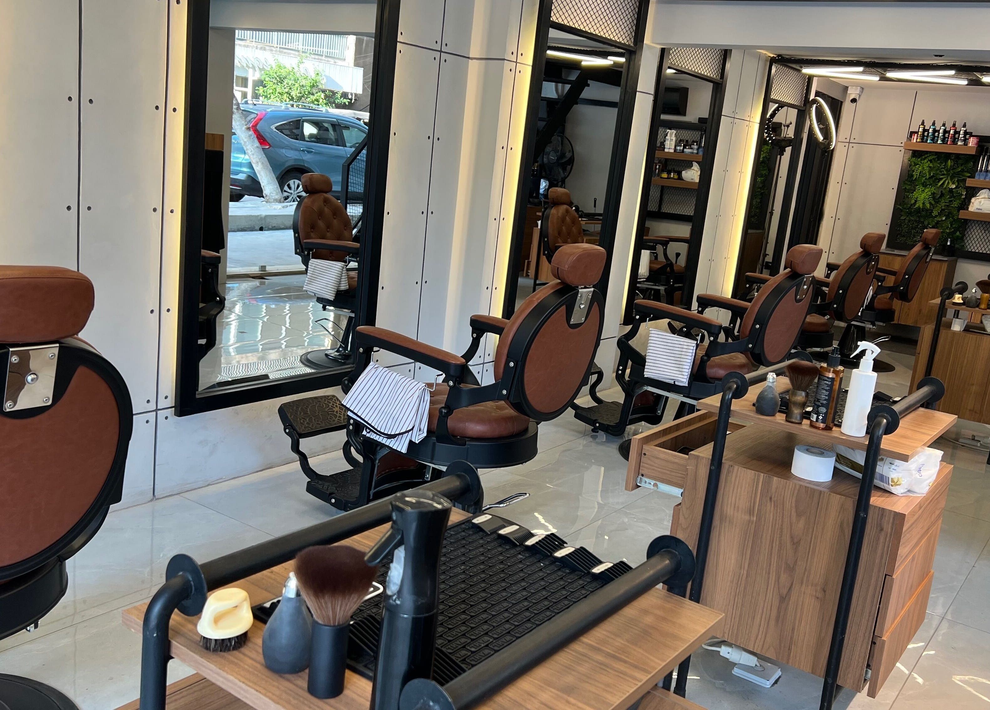 Elegant salon chairs at Hair Spot, Tarablus, North Governorate, LB, showcasing modern interior decor.