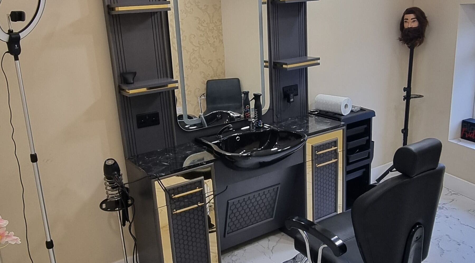 Elegant barber station at Charles Hair Reaper Ponteland, Ponteland, England, GB, showcasing modern styling tools.