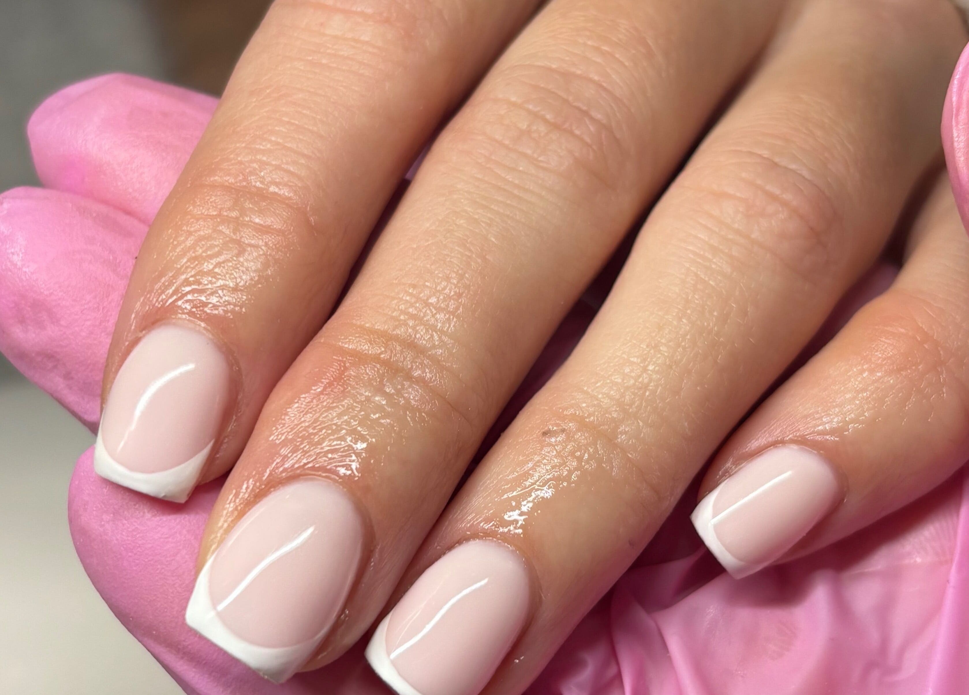 French manicure at Luxury Beauty Salon in Bromsgrove, England, GB. Perfectly polished nails.