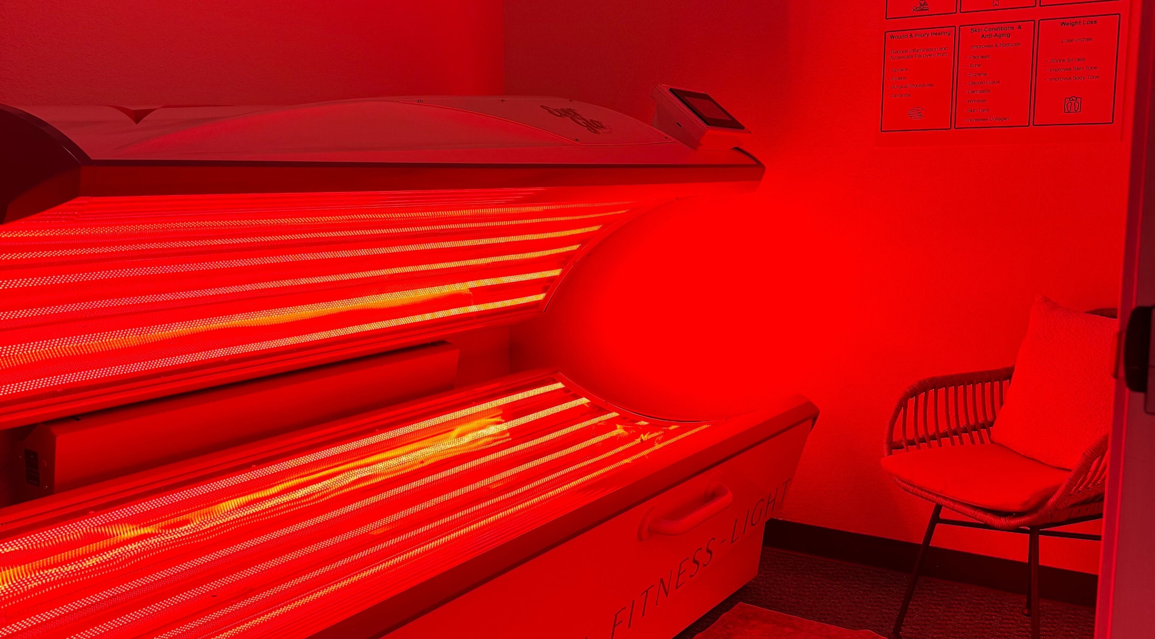 Red light therapy bed at EverGlo Studios, Henderson, Nevada, US, offering advanced wellness treatments.