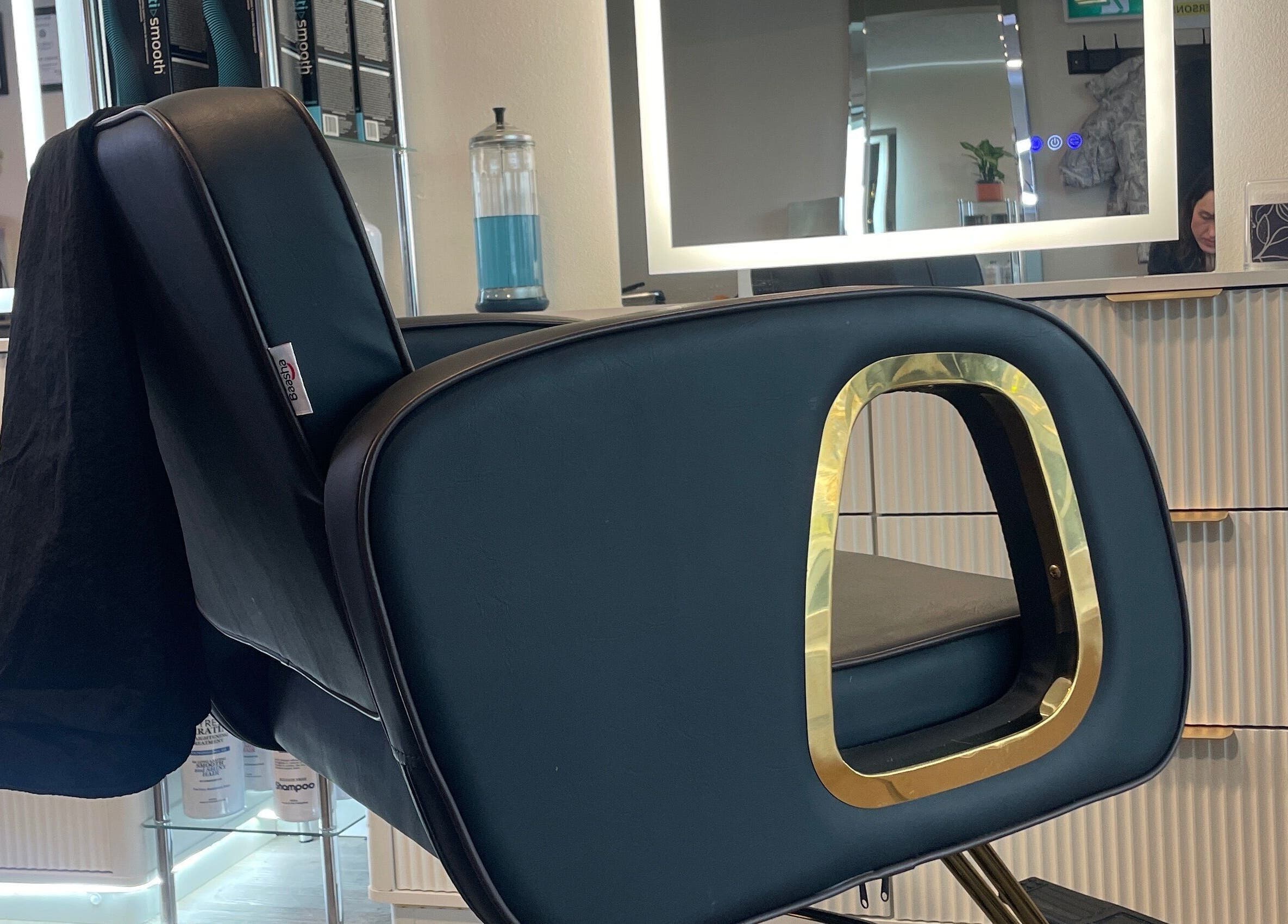 Elegant salon chair at Hair By Alyssa, Nanaimo, British Columbia, CA, reflecting modern luxury.