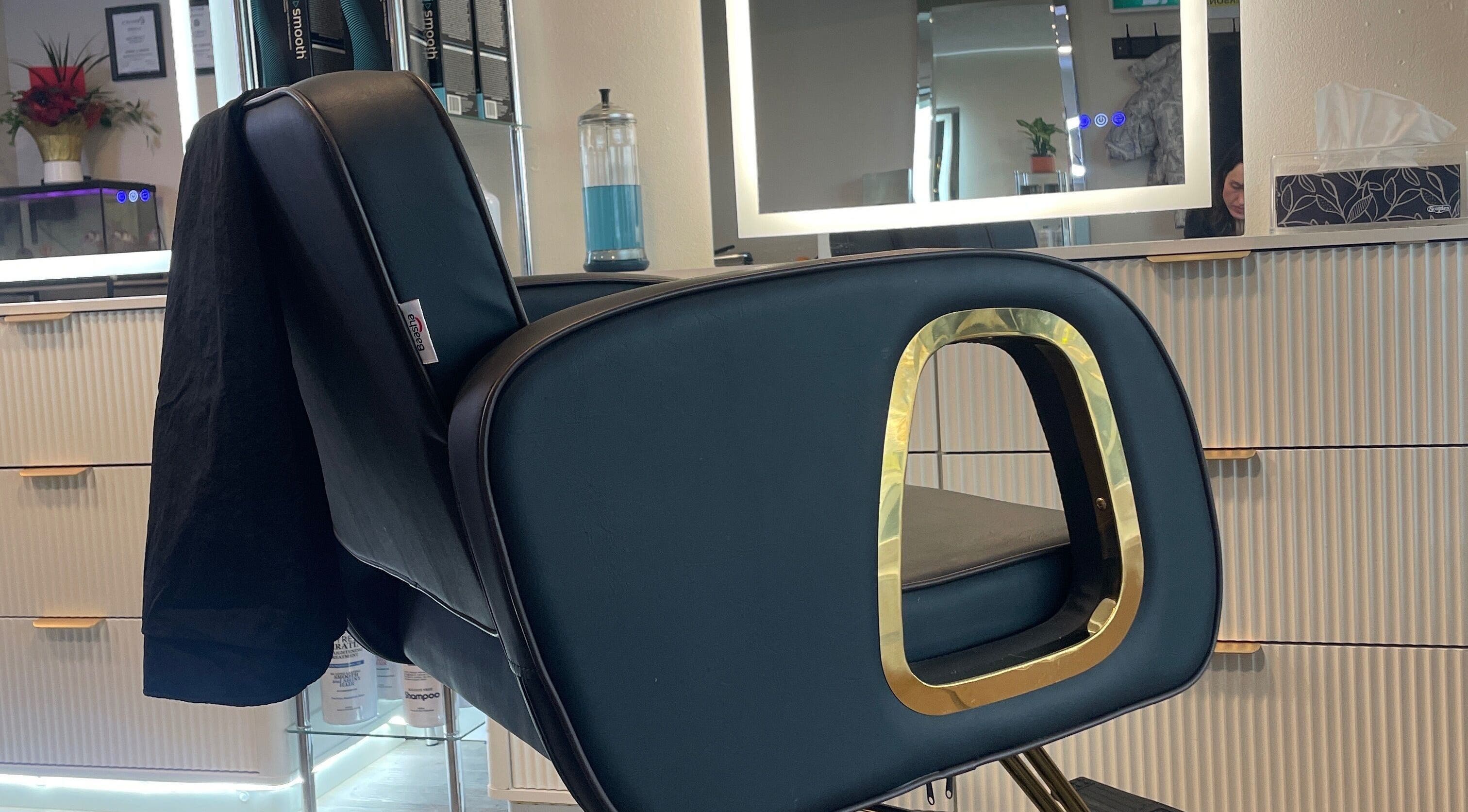 Elegant salon chair at Hair By Alyssa, Nanaimo, British Columbia, CA, reflecting modern luxury.