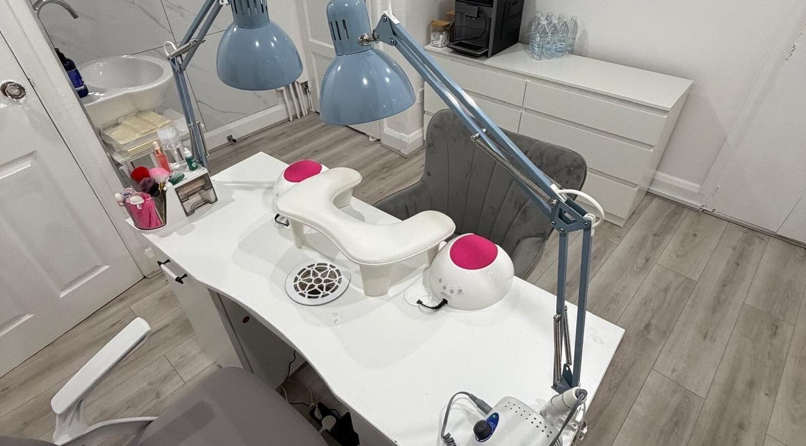 Modern nail station at Nail Room By Emilia, Bletchley, England, GB, featuring manicure tools and lighting.