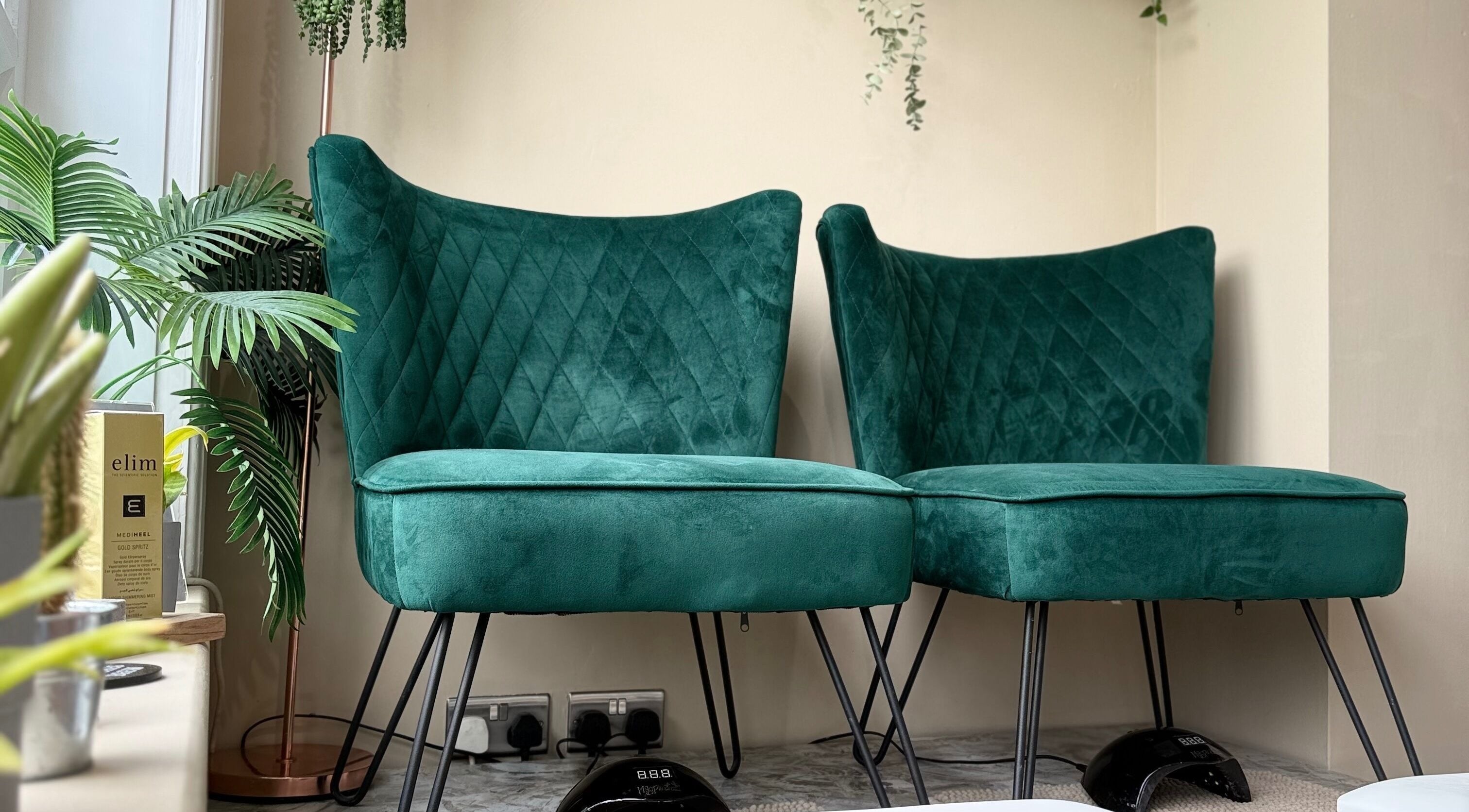 Elegant green chairs at SB Wellbeing in Chesterfield, England, GB, creating a relaxing ambiance.