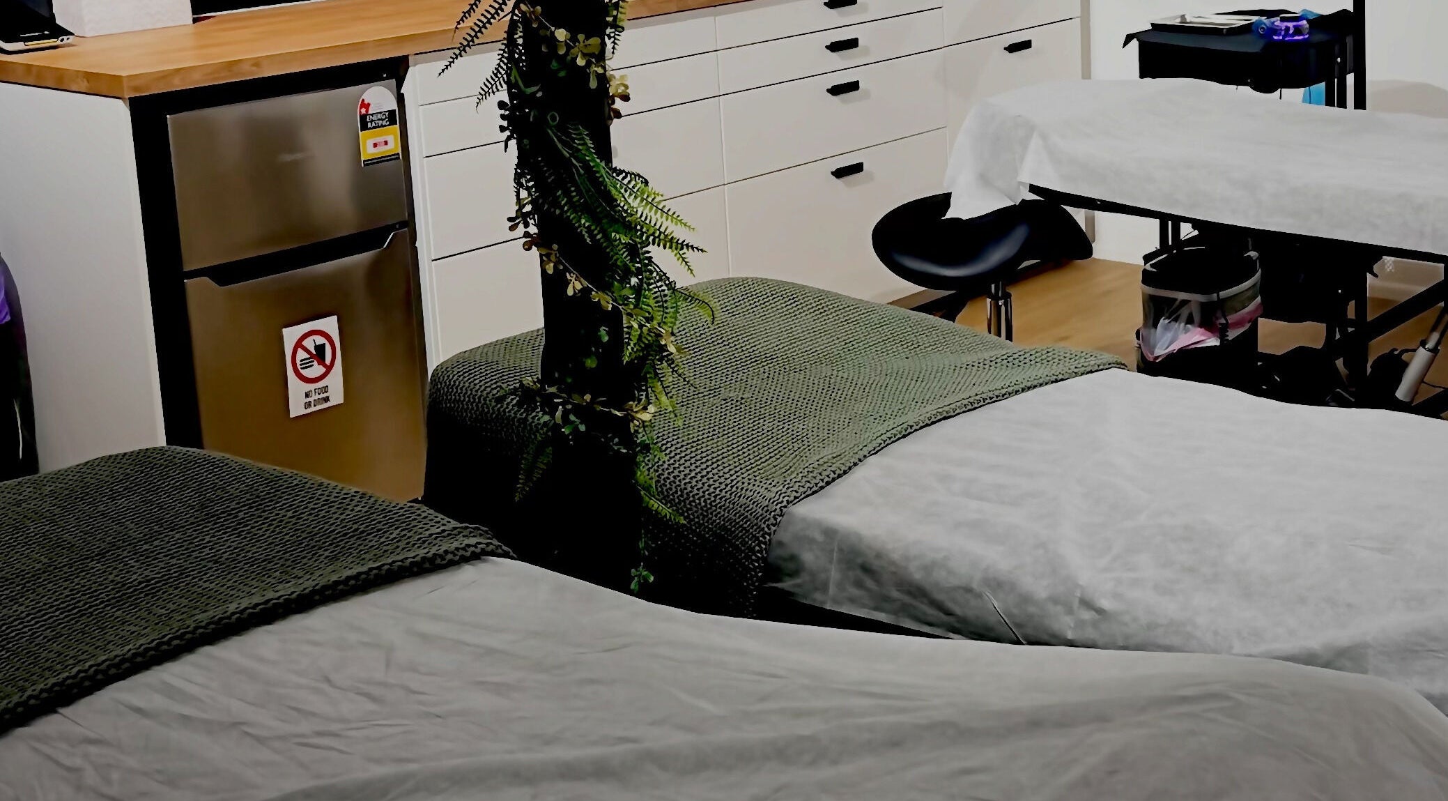 Cozy spa room at Zerda Beaute with two massage tables, Sunnybank Hills, Queensland, AU.