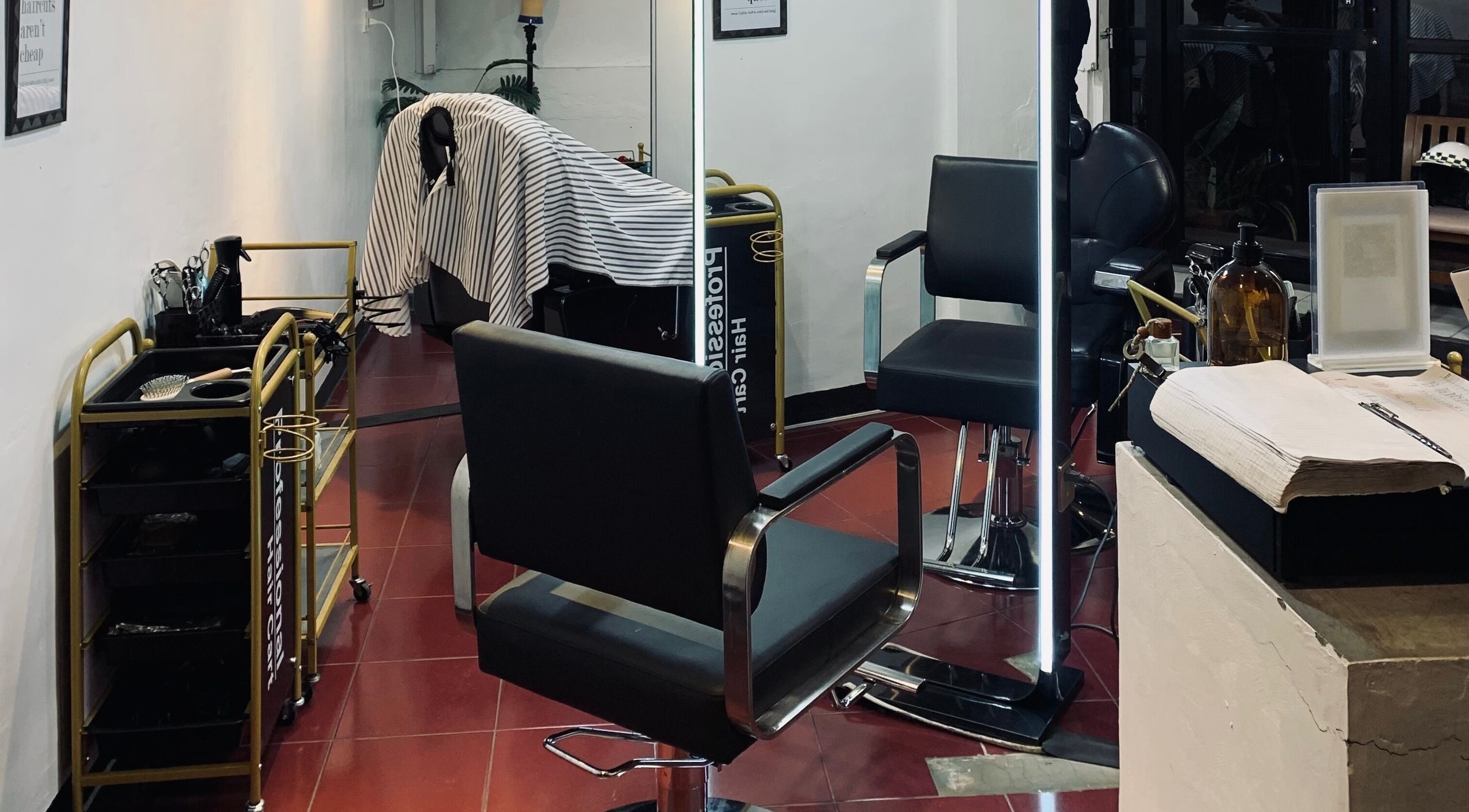 Interior of Blackspace Barbershop in Biñan, Calabarzon, PH featuring modern styling chairs and equipment.