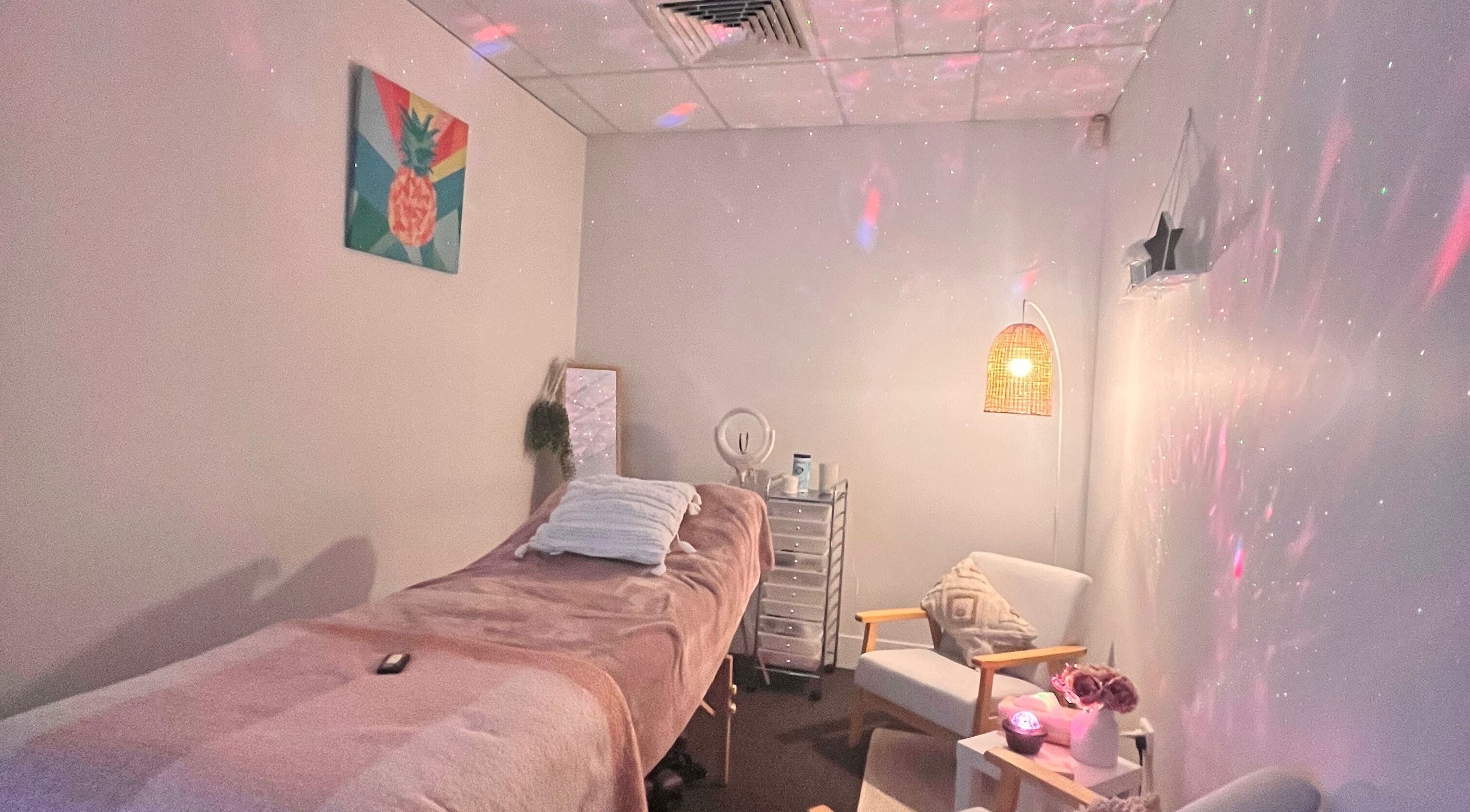 Cozy treatment room in Spiritual Shine, Perth, Western Australia, AU with soft lighting and comfortable decor.