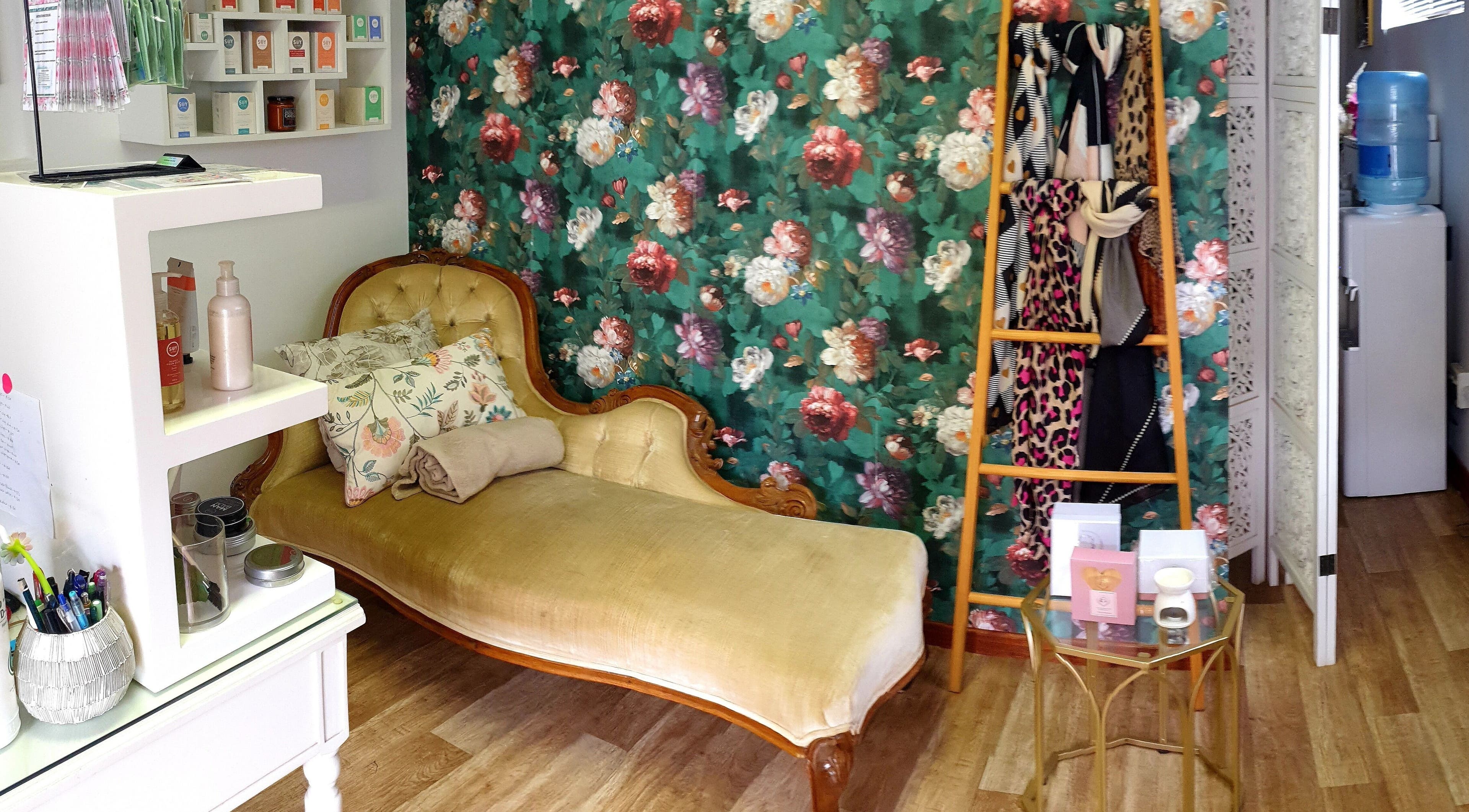 Elegant seating with floral decor at Eternal Beauty, Johannesburg, Gauteng, ZA, creating a serene oasis.