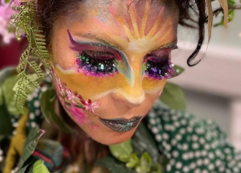 Intricate floral face art at E.p studio, Perth, Scotland, GB, showcasing vibrant colors and creativity.