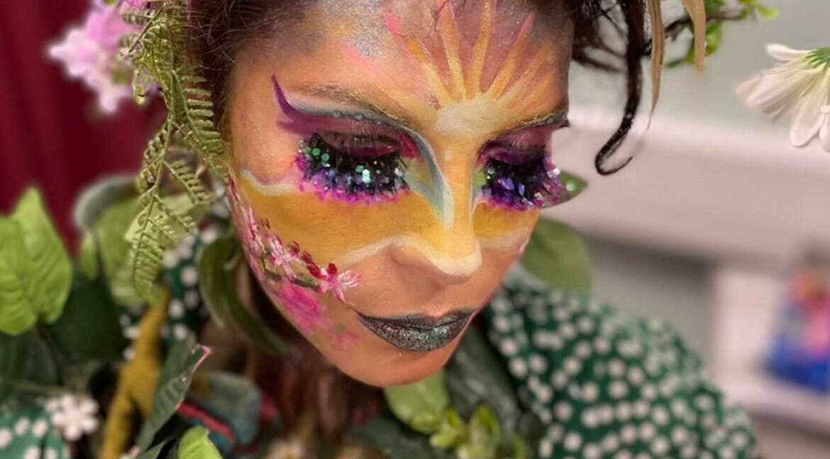 Intricate floral face art at E.p studio, Perth, Scotland, GB, showcasing vibrant colors and creativity.