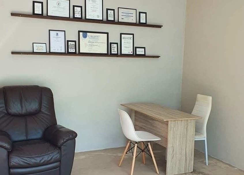 Elegant office corner with leather chair and desk at ALS Beauty, Cape Town, Western Cape, ZA.