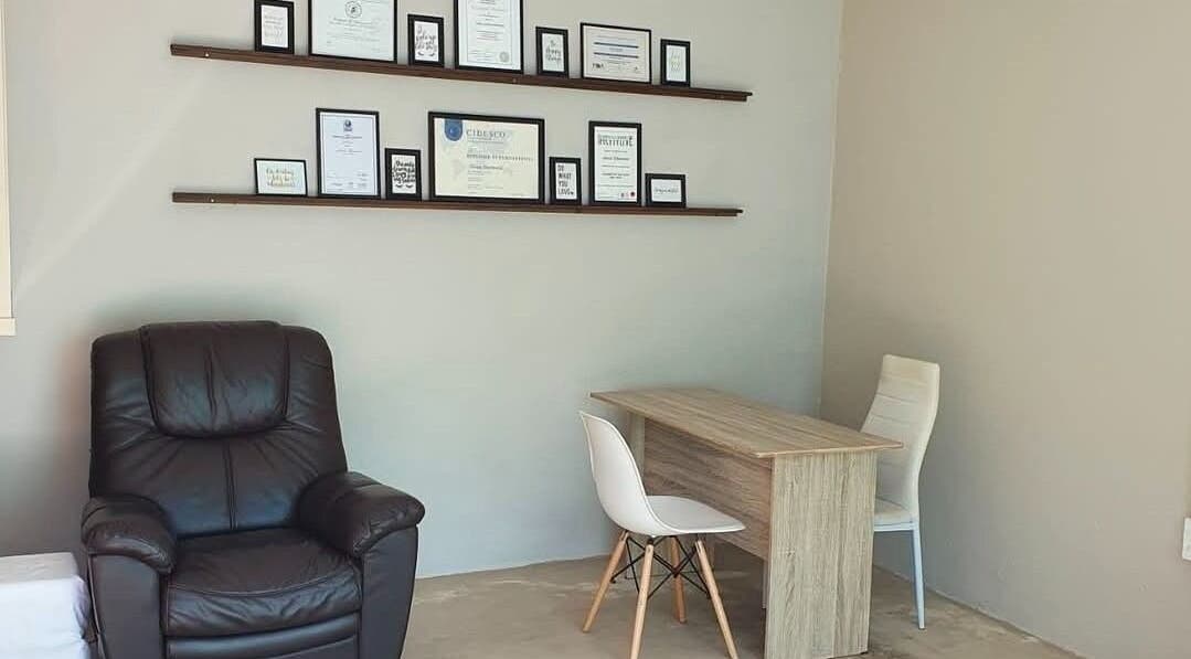Elegant office corner with leather chair and desk at ALS Beauty, Cape Town, Western Cape, ZA.