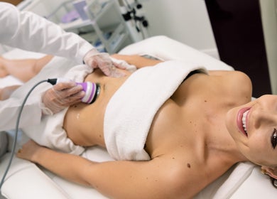 Client enjoys relaxing body treatment at Fran Bonfim Aesthetics in Margate, Florida, US.