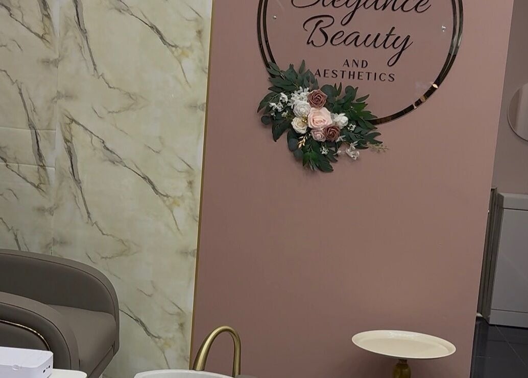 Luxurious seating inside Elegance Beauty and Aesthetics, London, England, GB with modern decor.