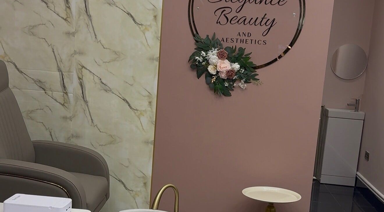 Luxurious seating inside Elegance Beauty and Aesthetics, London, England, GB with modern decor.