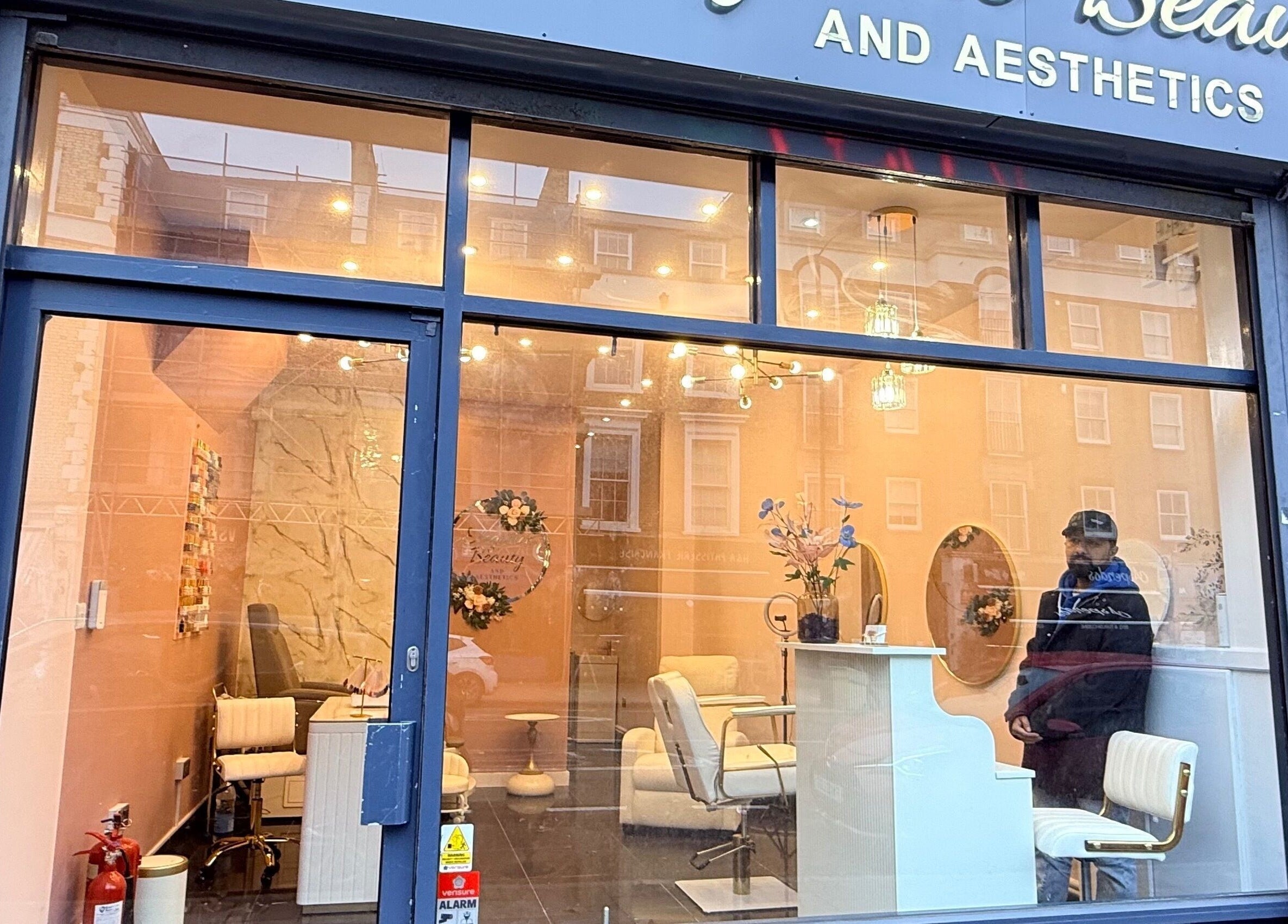 Front view of Elegance Beauty and Aesthetics in London, England, GB, showcasing elegant interior design.