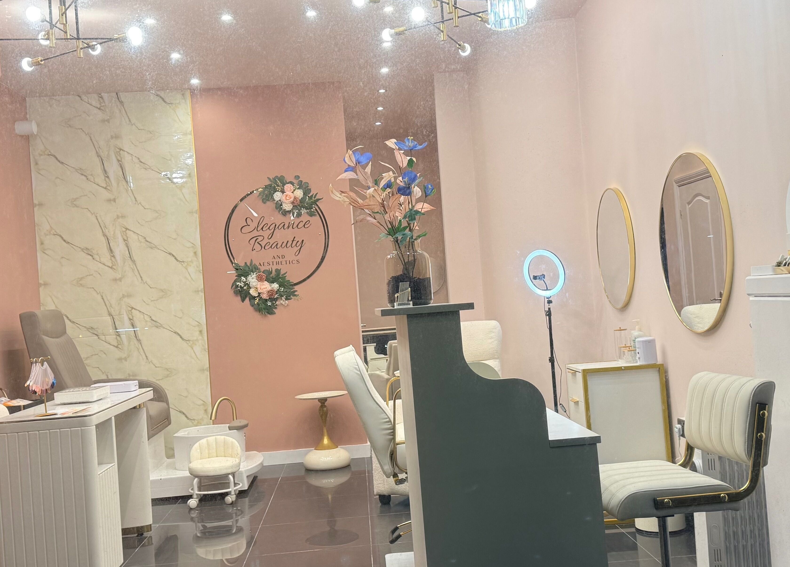 Elegance Beauty and Aesthetics London salon interior showcasing chic decor and modern styling.