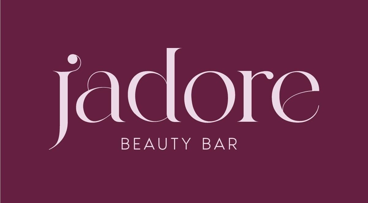 Logo of J’adore beauty bar, Jabal Lubnan, Jabal Lubnan, LB on a rich purple background.