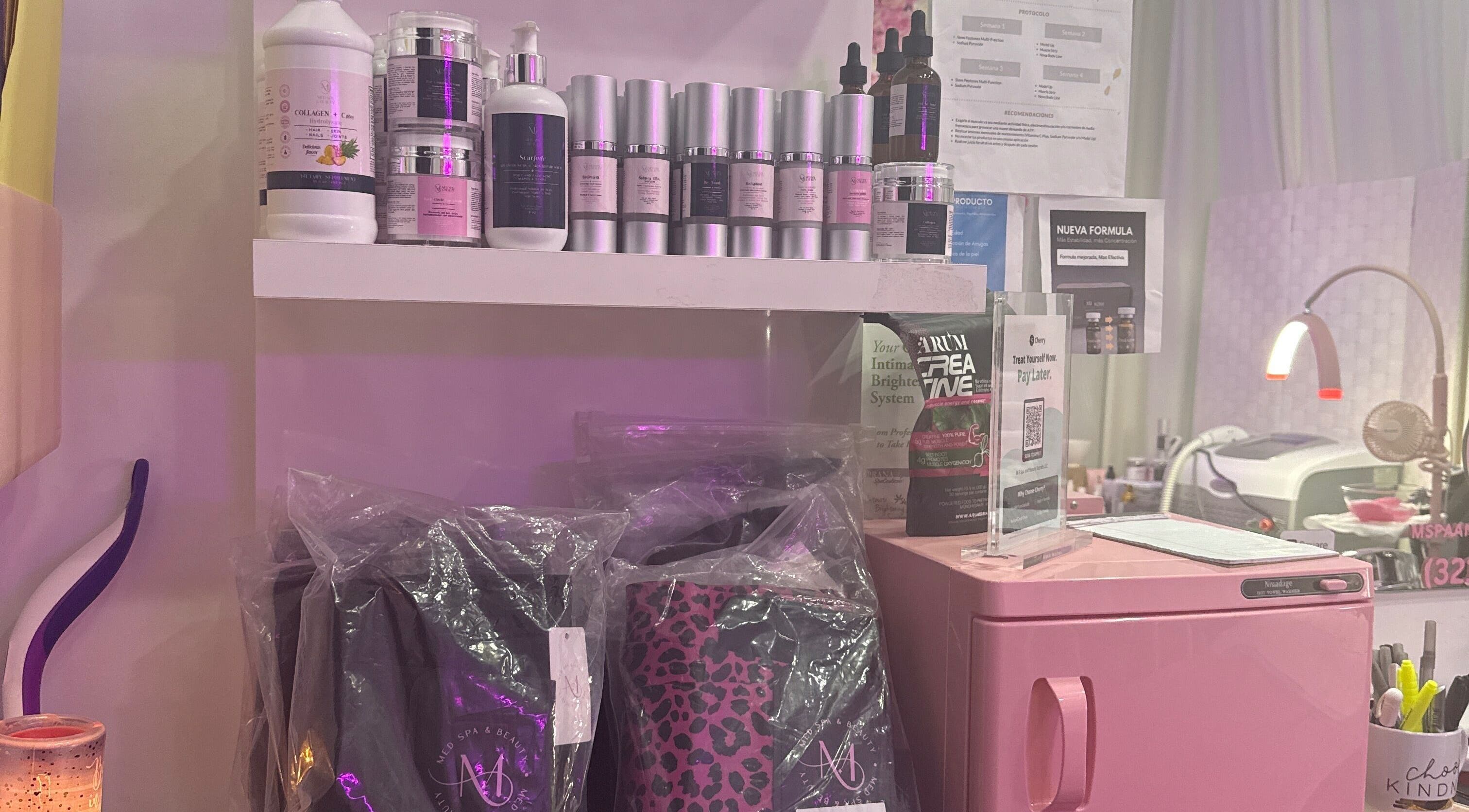 Beauty products and tools at M Med Spa & Beauty, Orlando, Florida, US, showcasing a variety of skincare items.
