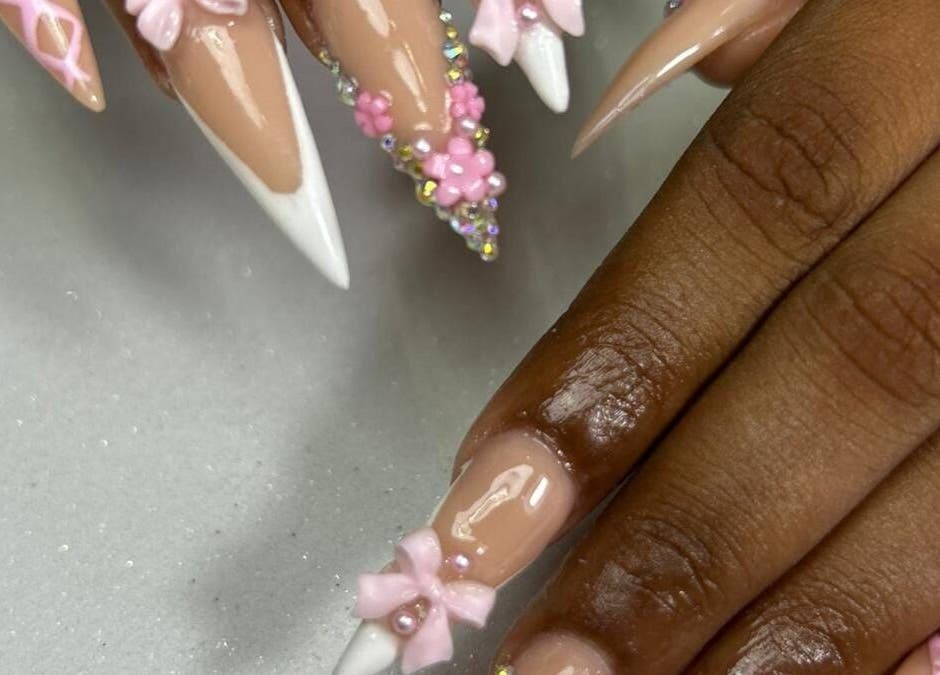 Intricate pink floral nail art at Nailedtothe T, Willemstad, Curaçao, CW showcasing elegance and style.