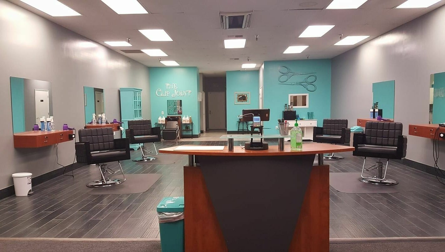 Modern interior of The Clip Joint in Yelm, Washington, US with sleek chairs and elegant decor.