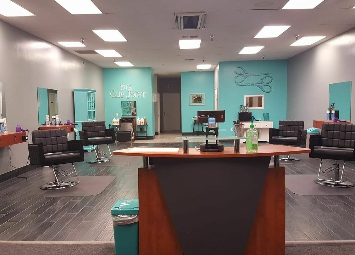 Modern interior of The Clip Joint in Yelm, Washington, US with sleek chairs and elegant decor.