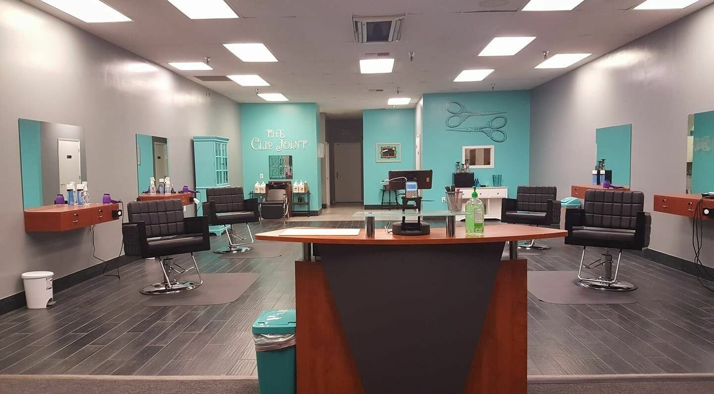 Modern interior of The Clip Joint in Yelm, Washington, US with sleek chairs and elegant decor.