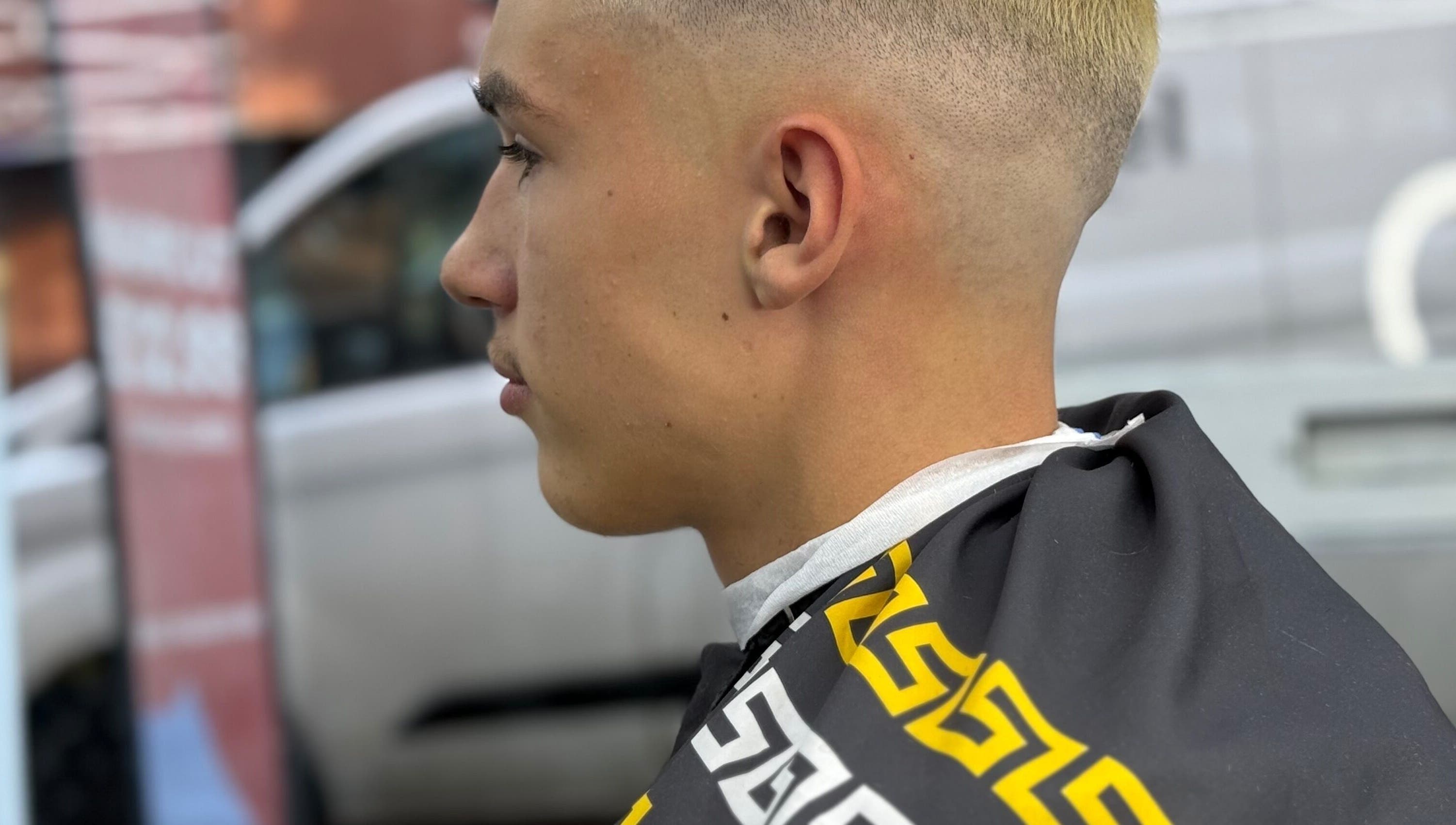 Profile view of a modern buzzcut at Barber 36, Birmingham, England, GB. Expert styling enhances this fresh look.