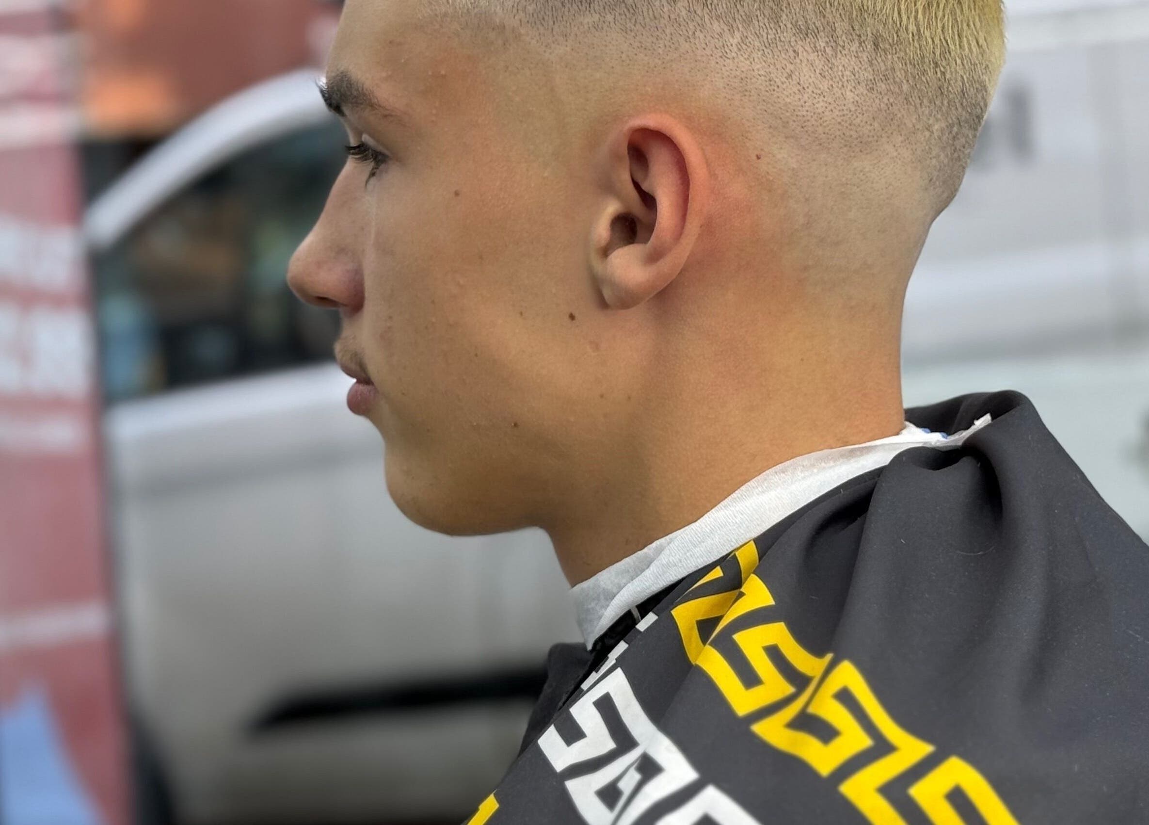 Profile view of a modern buzzcut at Barber 36, Birmingham, England, GB. Expert styling enhances this fresh look.