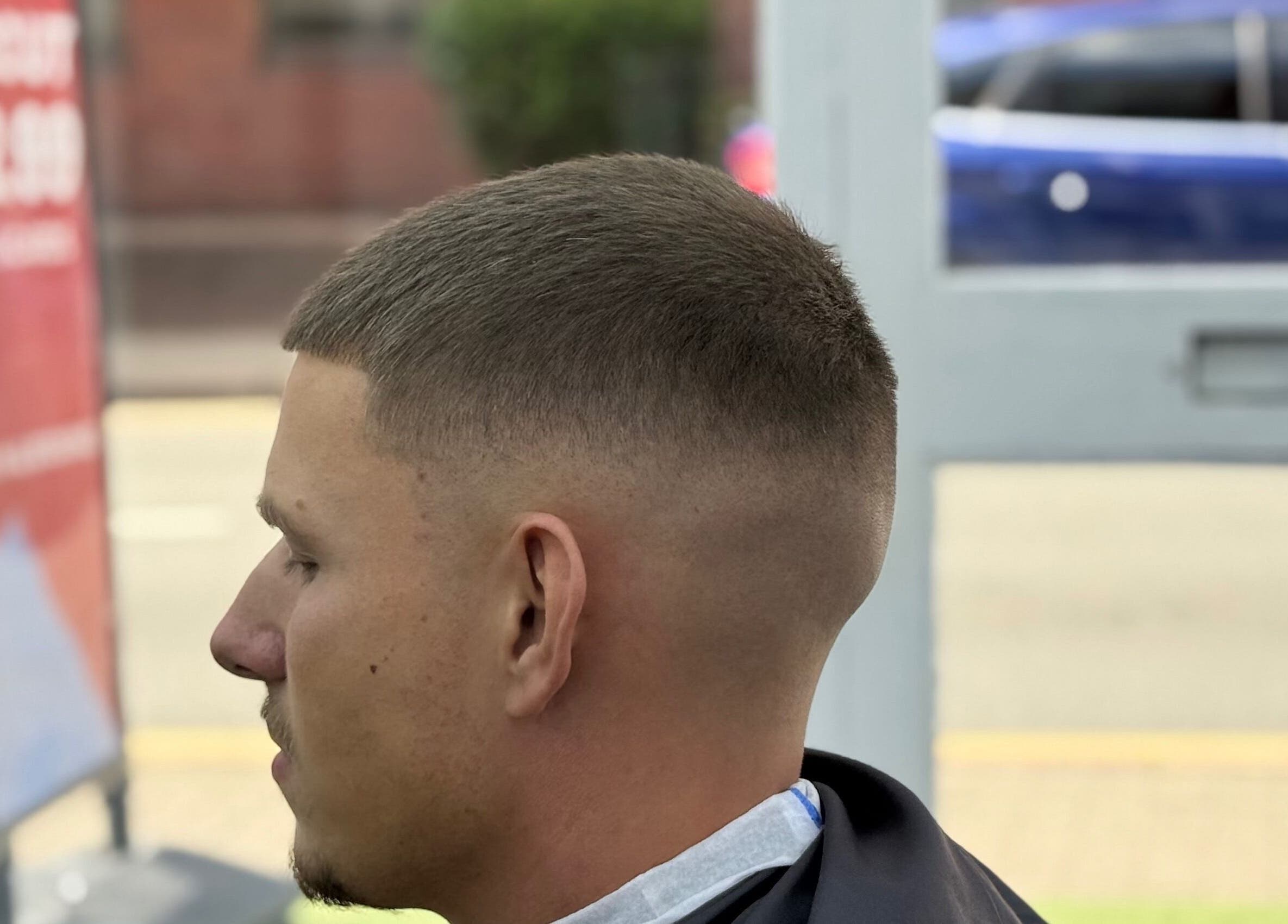 Modern fade haircut at Barber 36 in Birmingham, England, GB, showcasing expert clipping and style.