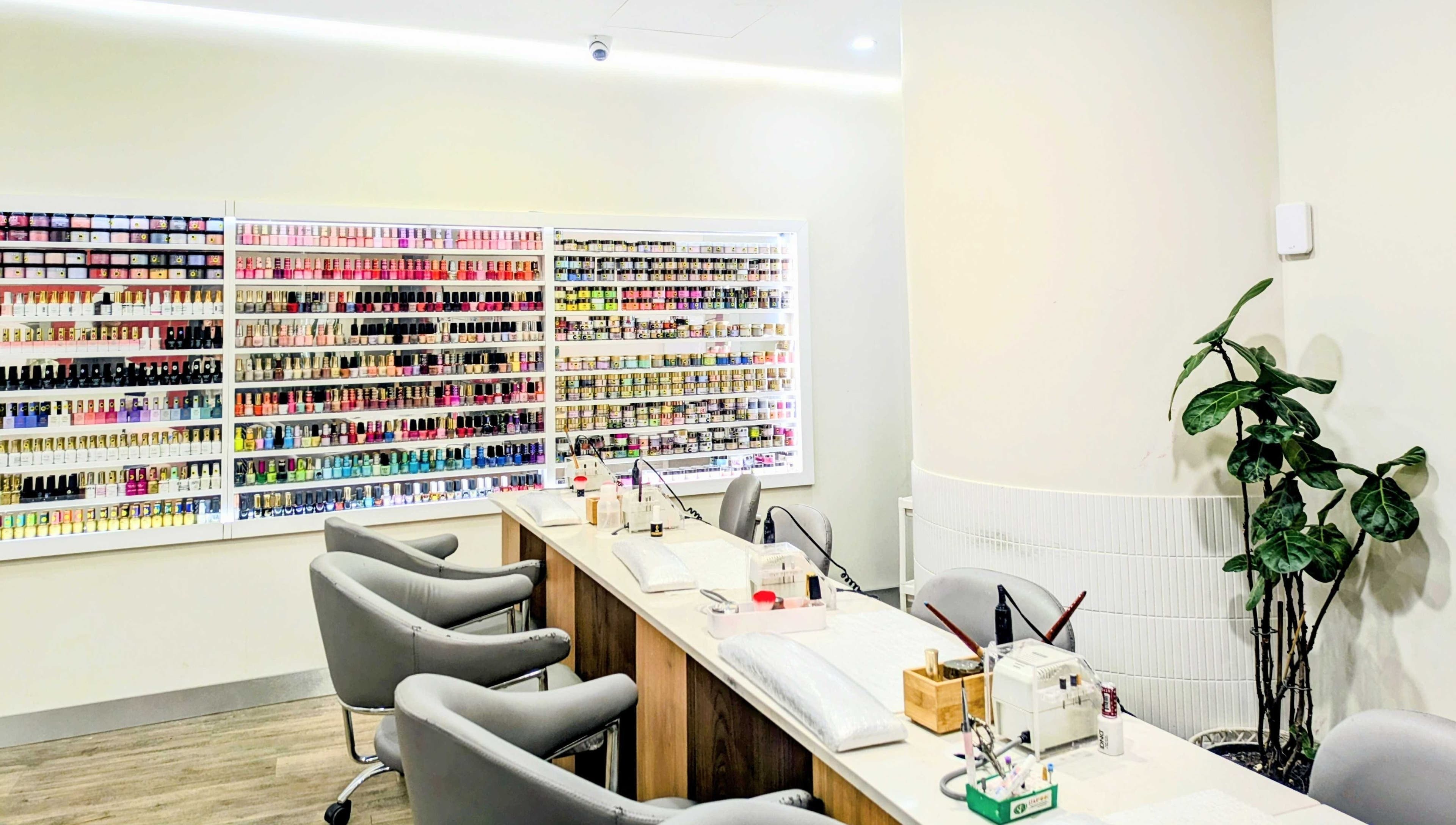 Interior of Aurora Luxe Nails (Stockland Piccadilly) in Sydney, New South Wales, AU, showcasing extensive nail polish selection.