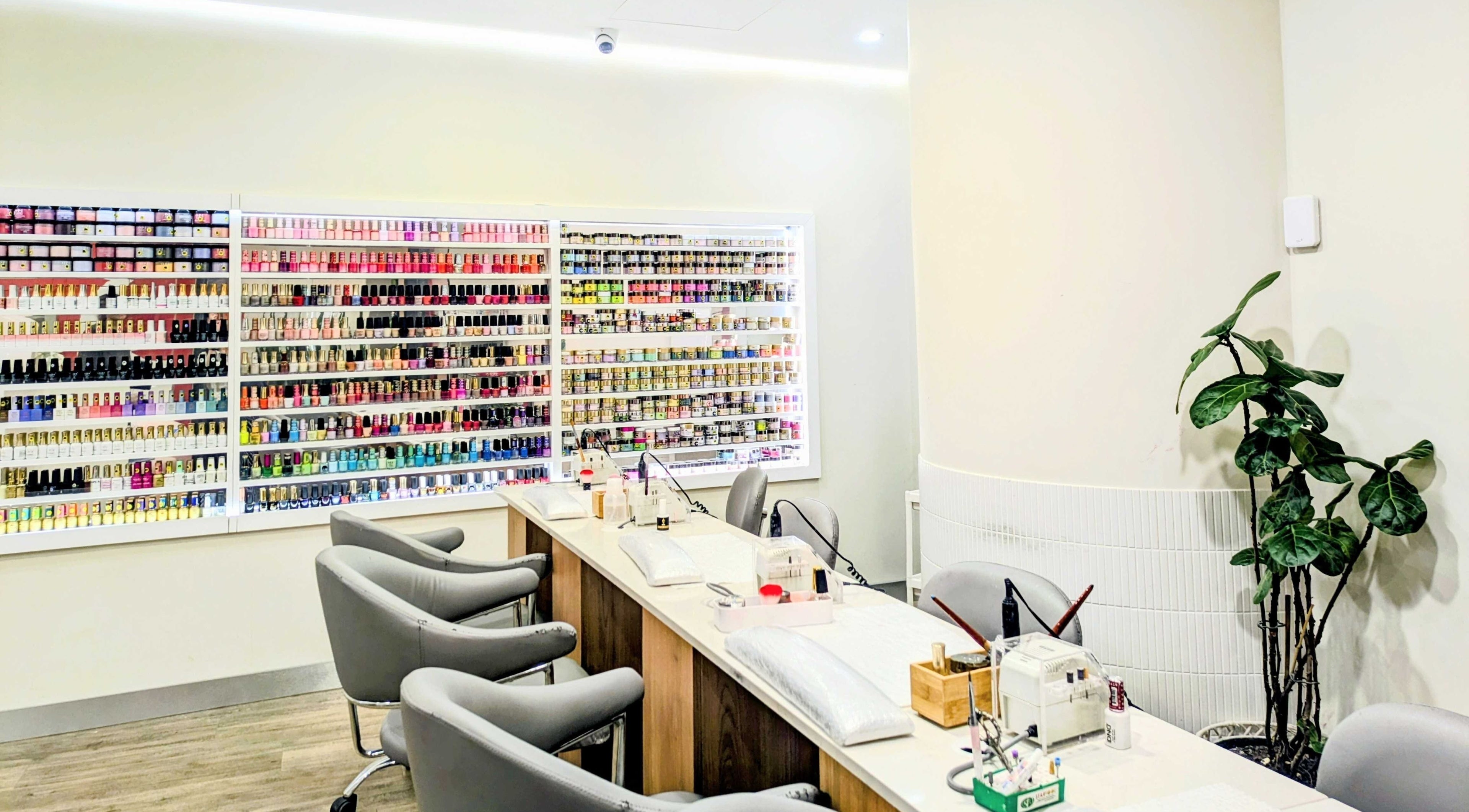 Interior of Aurora Luxe Nails (Stockland Piccadilly) in Sydney, New South Wales, AU, showcasing extensive nail polish selection.