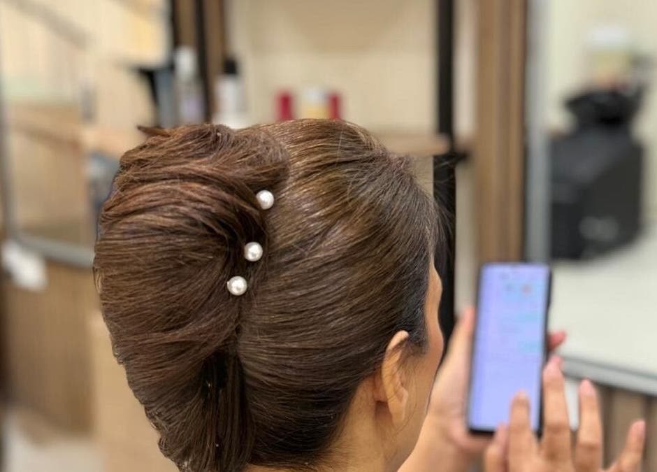 Elegant updo hairstyle at Hair & More by Hanan, Al Hidd, Muḥāfaẓat Al-muḥarraq, BH.