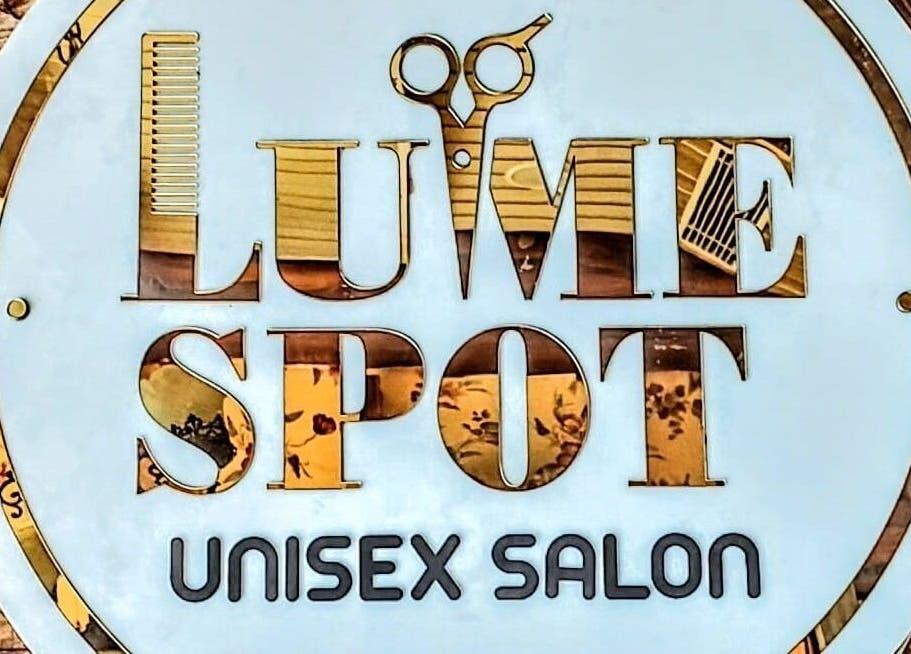 LumeSpot unisex salon logo sign in Greater Noida, Uttar Pradesh, India, featuring scissors and comb design.