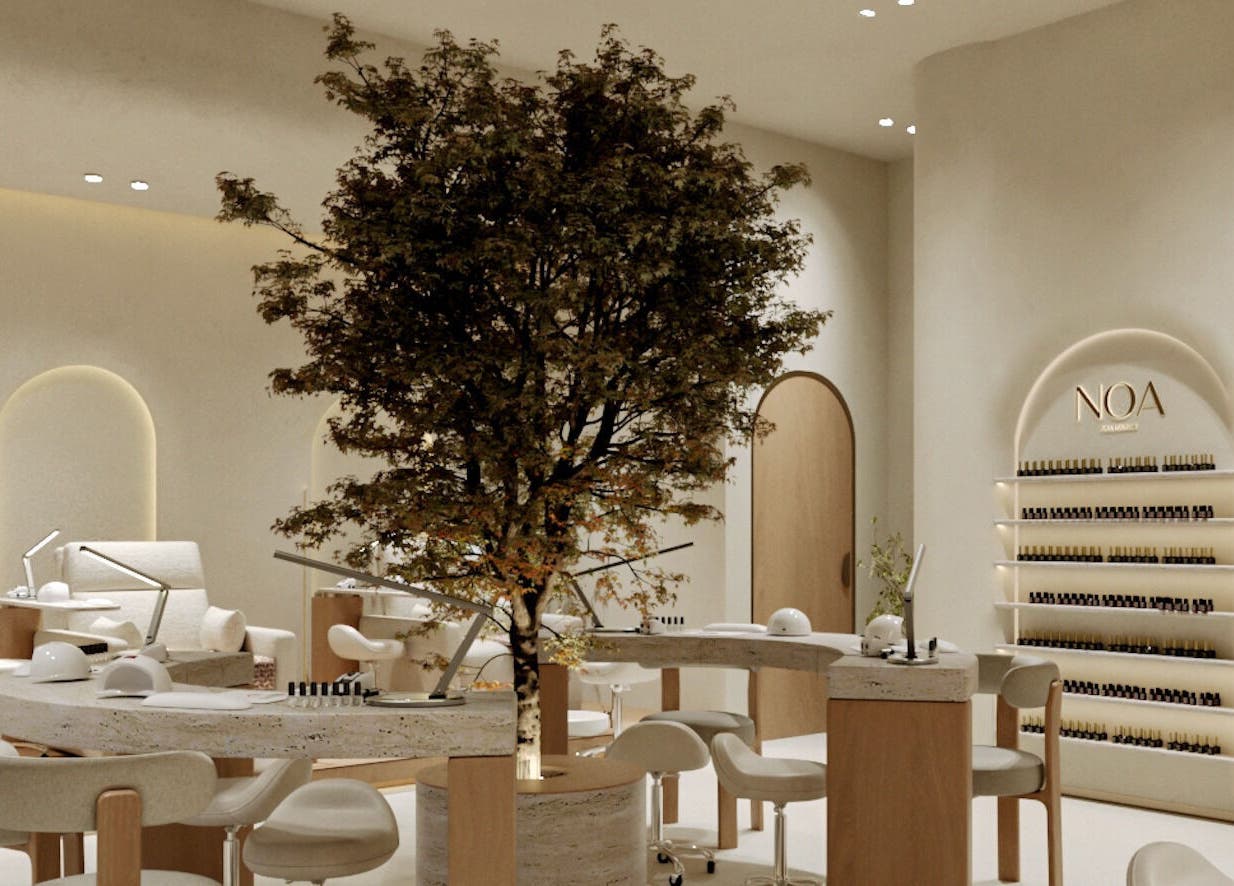 Elegant interior of NOA Nails in Abu Dhabi, AE featuring tranquil decor and modern nail care stations.