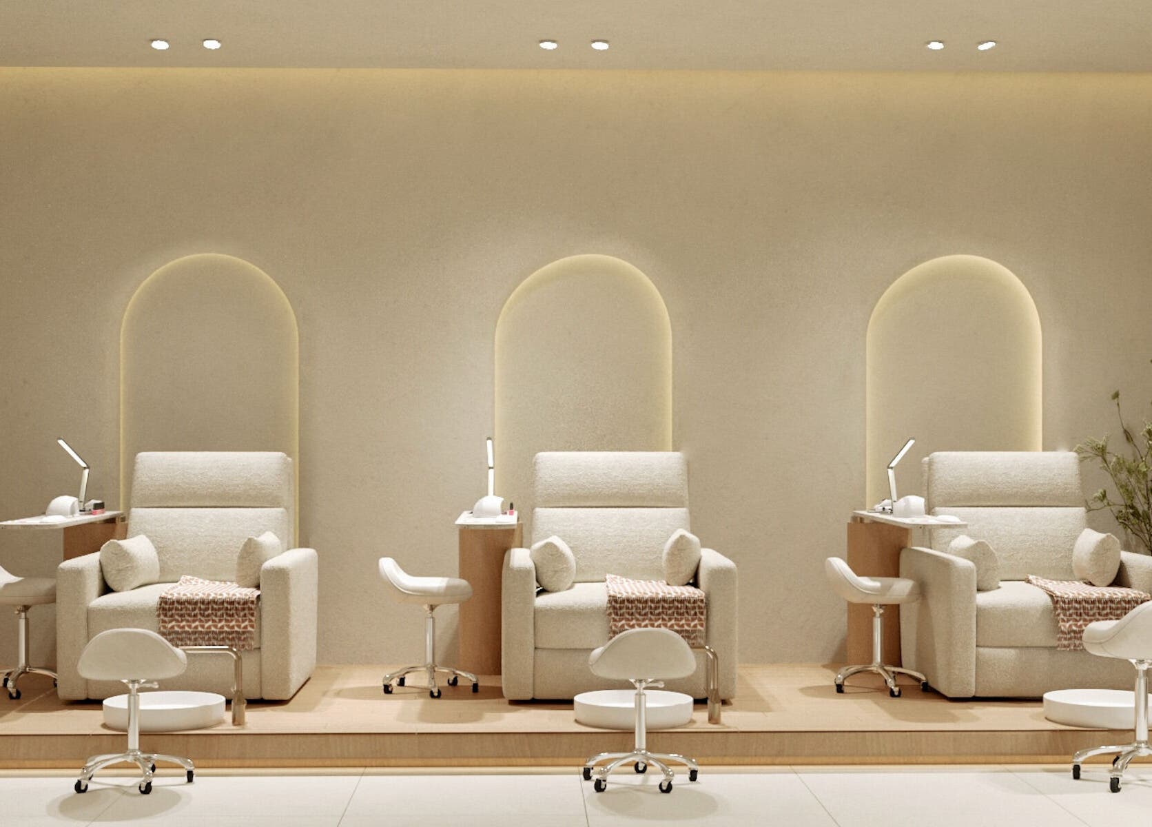 Luxurious pedicure chairs at NOA Nails, Abu Dhabi, AE with soft lighting and stylish decor.