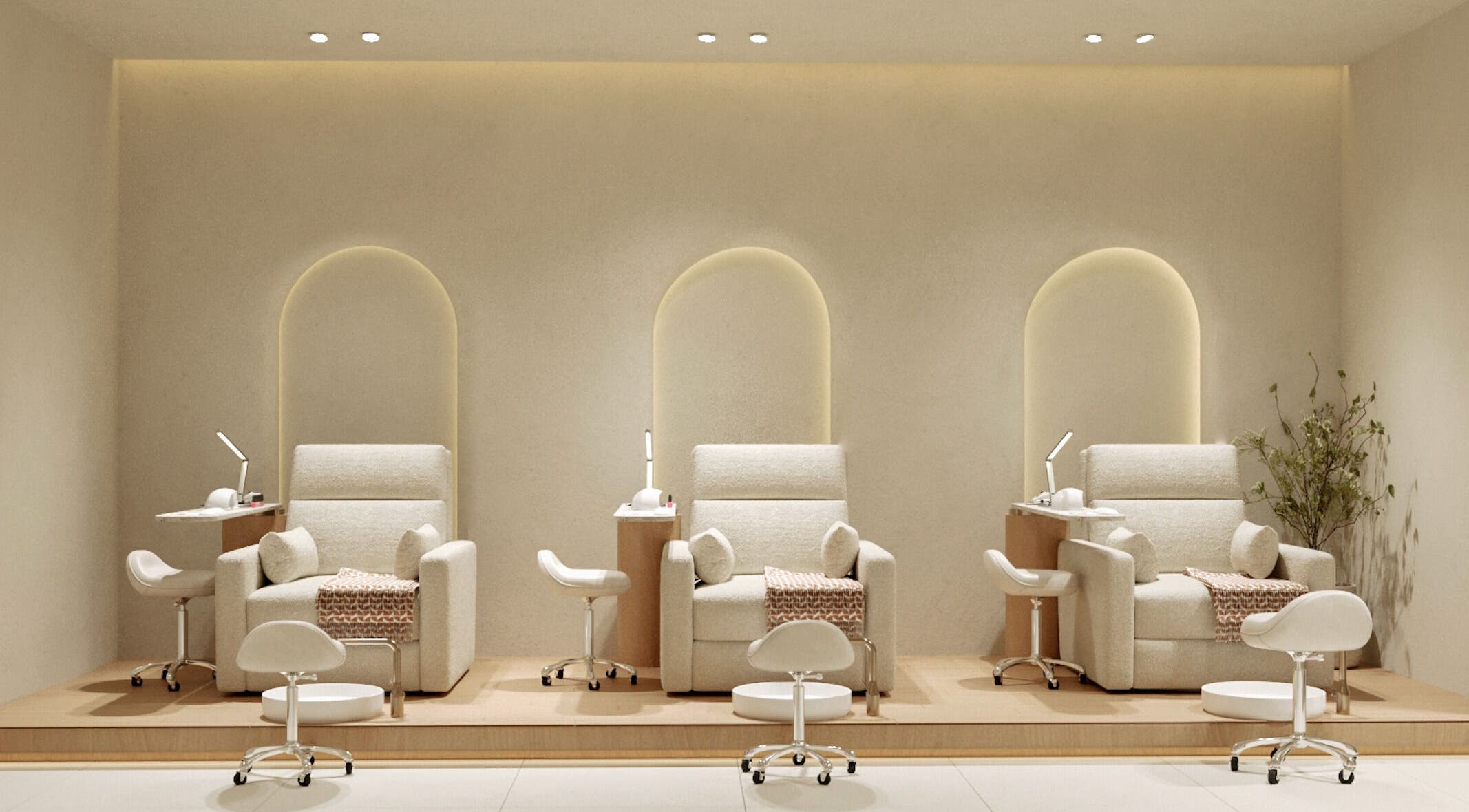 Luxurious pedicure chairs at NOA Nails, Abu Dhabi, AE with soft lighting and stylish decor.