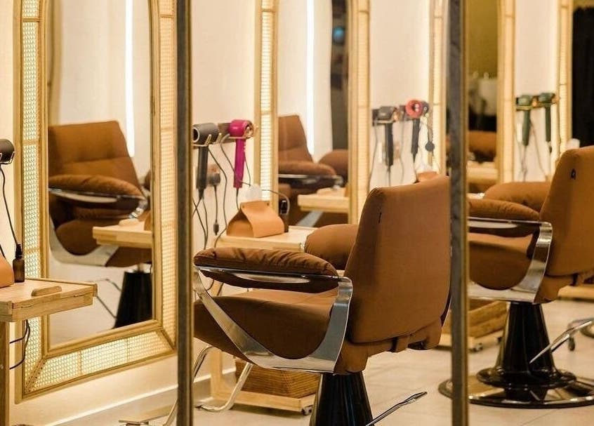 Elegant salon chairs with mirrors at Insyra Salon, Ahmedabad, Gujarat, IN.