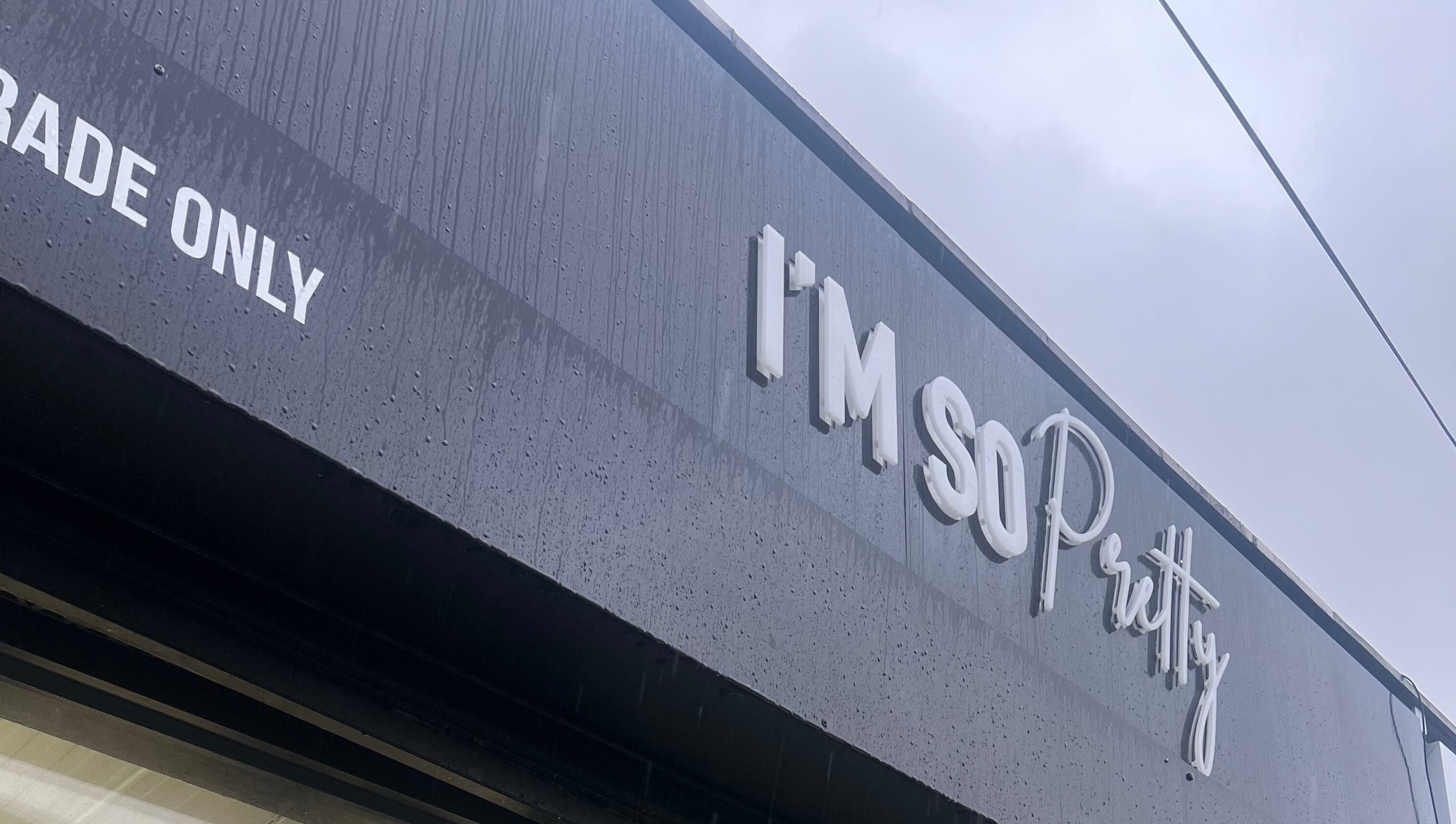 Exterior view of Lashmelovely, Liverpool, England, GB showcasing chic store signage in stylish font.