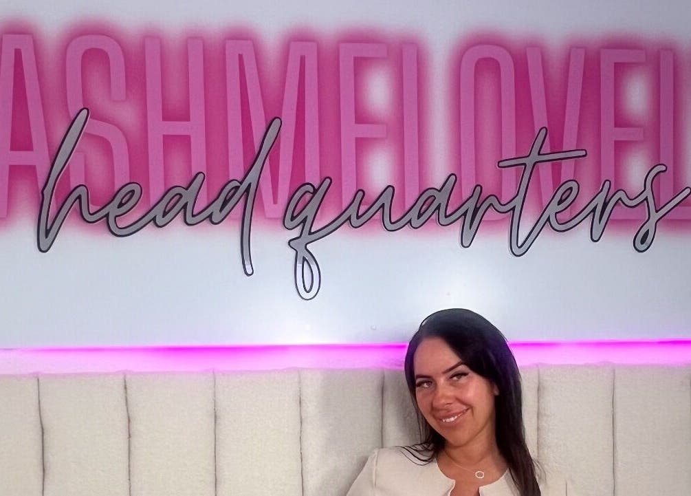 Lashmelovely venue interior with stylish pink sign in Liverpool, England, GB.