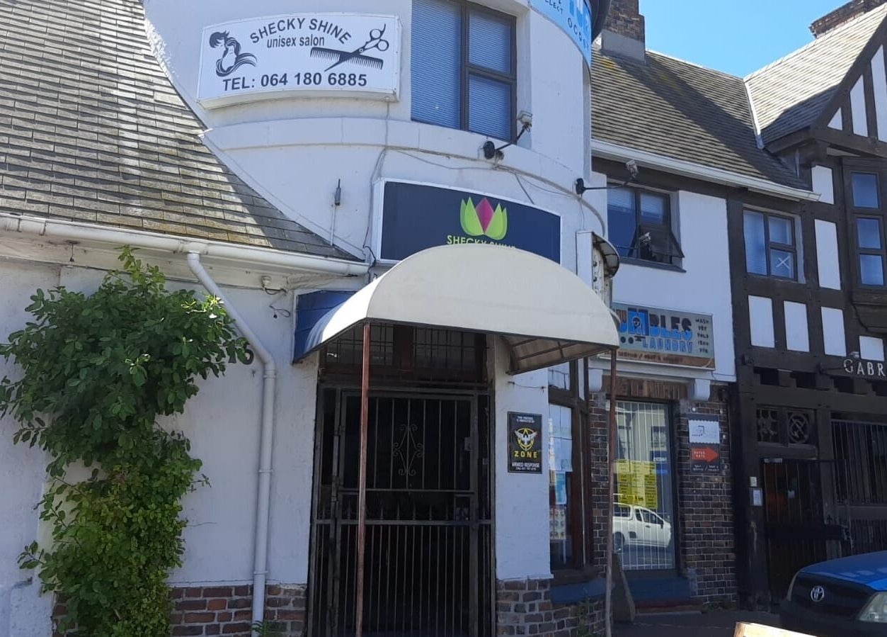 Front view of Sheckies Hair and Beauty Salon in Cape Town, Western Cape, ZA, showcasing its charming entrance.