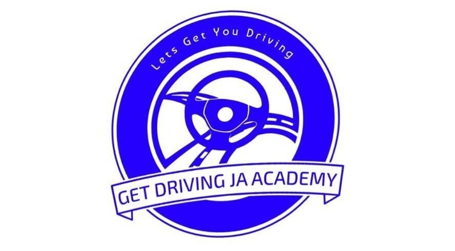 Logo of Get Driving Ja Academy in Kingston, St. Andrew Parish, JM featuring a steering wheel design.
