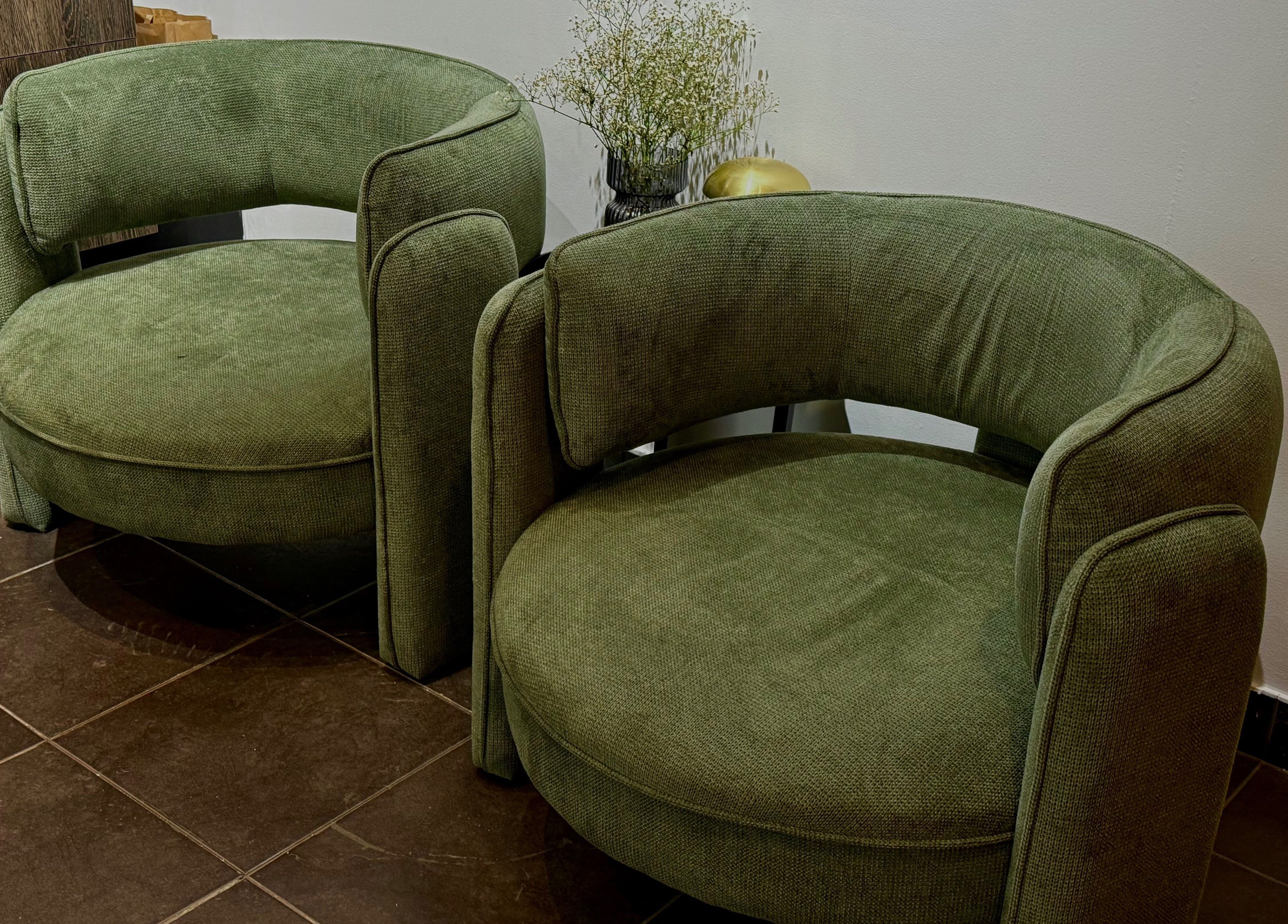 Cozy green chairs at Last Quarter Nail in Melbourne, Victoria, AU, offering a serene ambiance for relaxation.