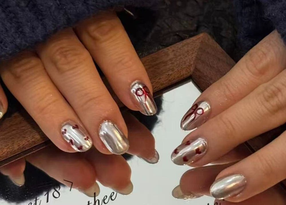 Metallic nail art with red details at Last Quarter Nail in Melbourne, Victoria, AU.