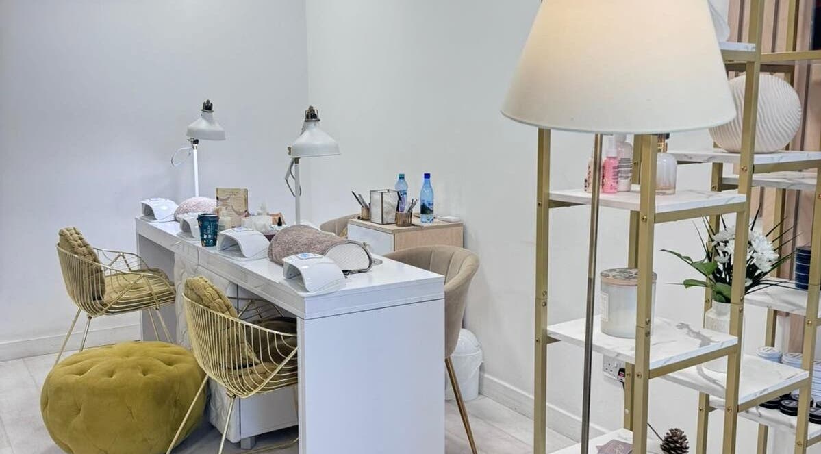 Chic nail salon interior at MP Nails and Beauty, Northampton, England, GB, featuring elegant decor and manicured stations.