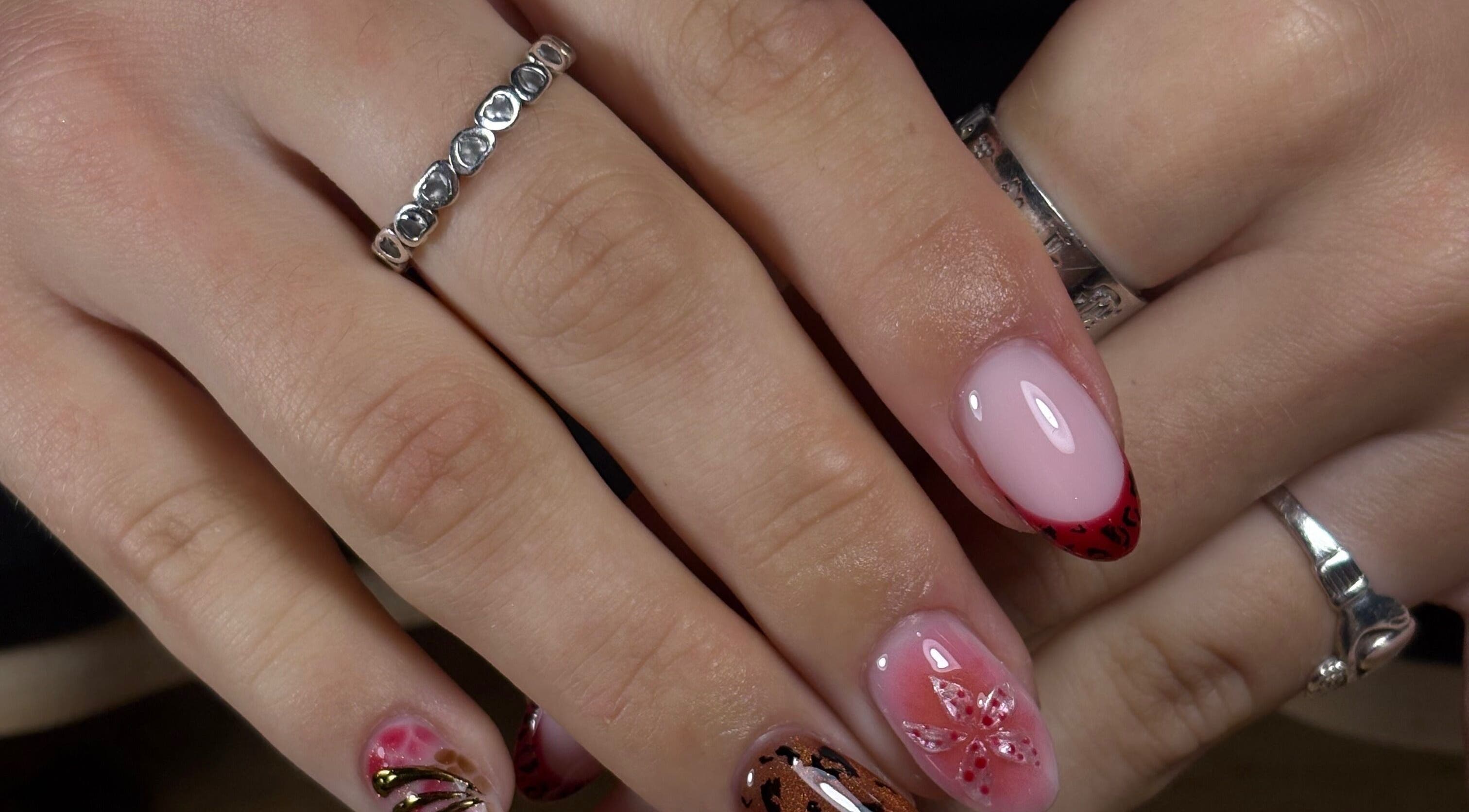 Colorful nail art from ligi.nails_ in Buncrana, County Donegal, IE showcasing intricate designs.